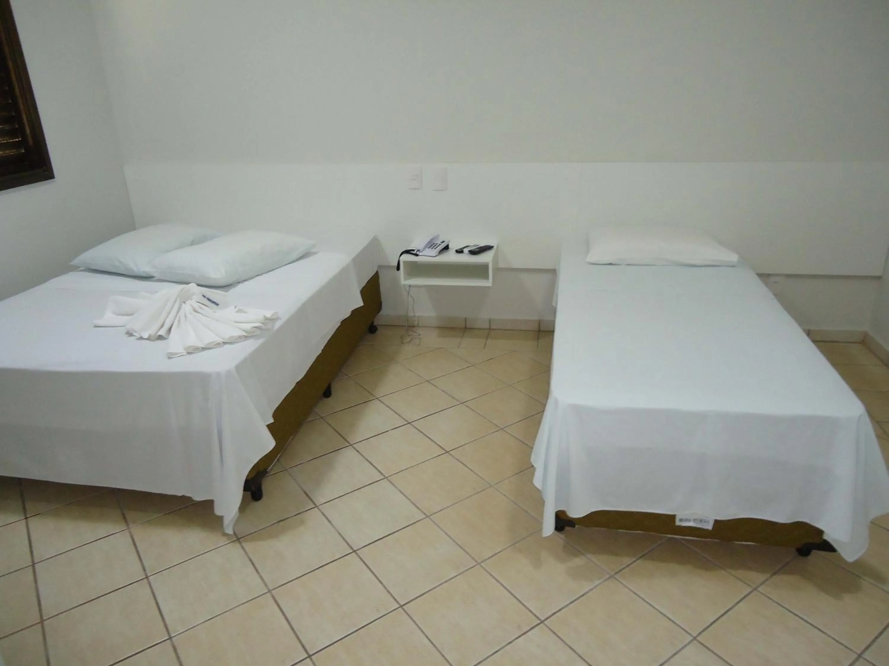 Bed in Big Executive Hotel