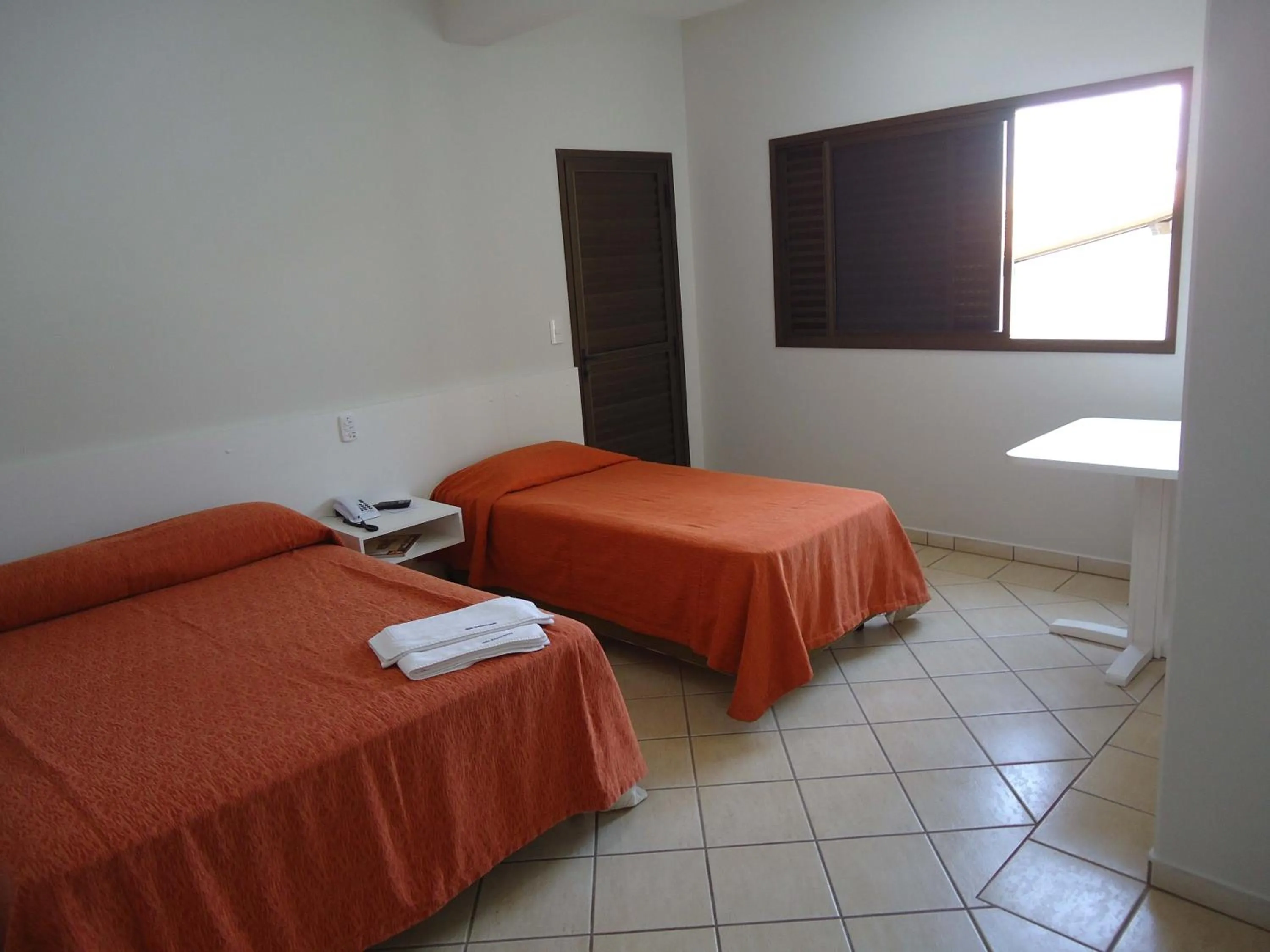 Bed in Big Executive Hotel