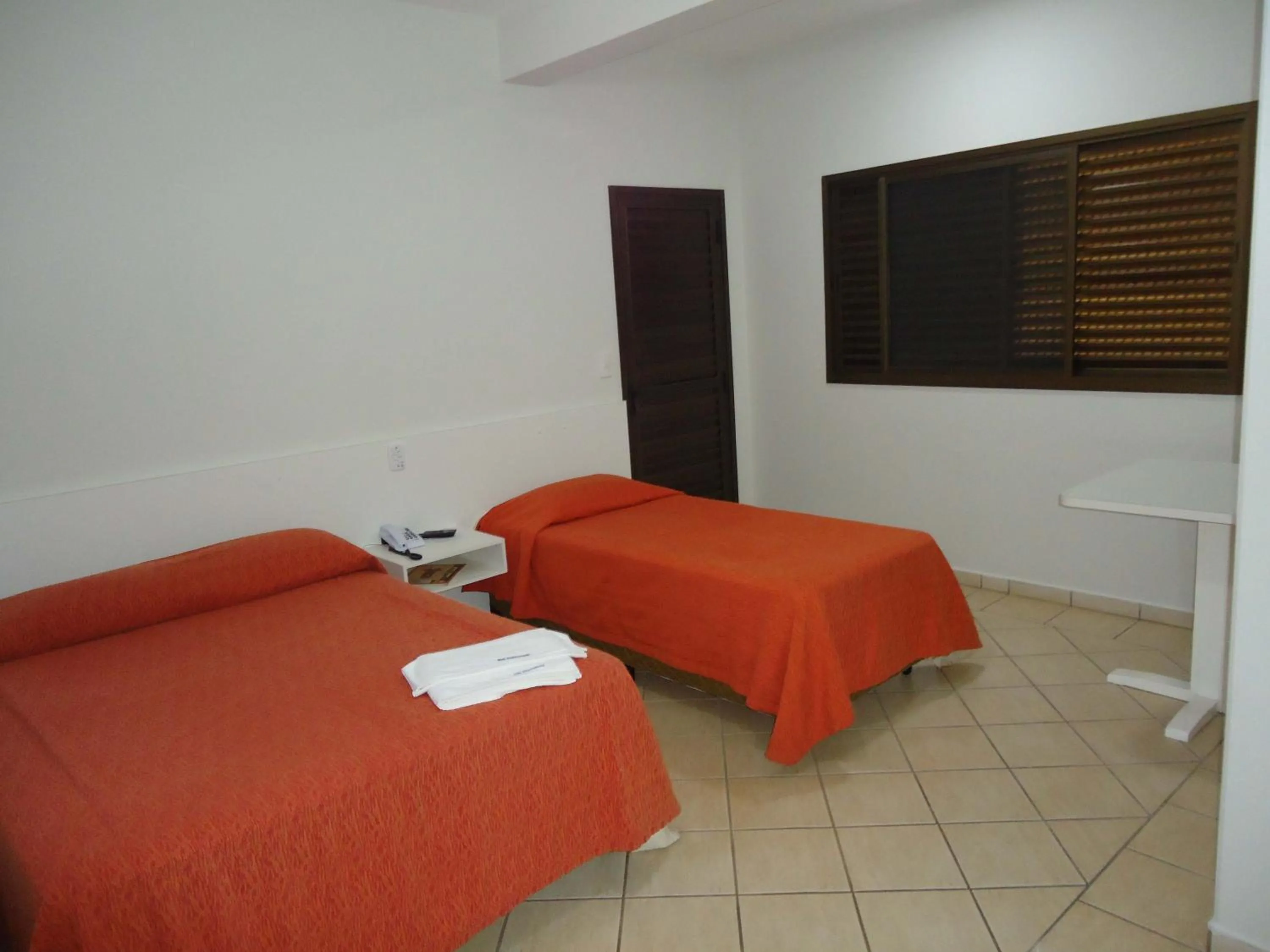 Bed in Big Executive Hotel