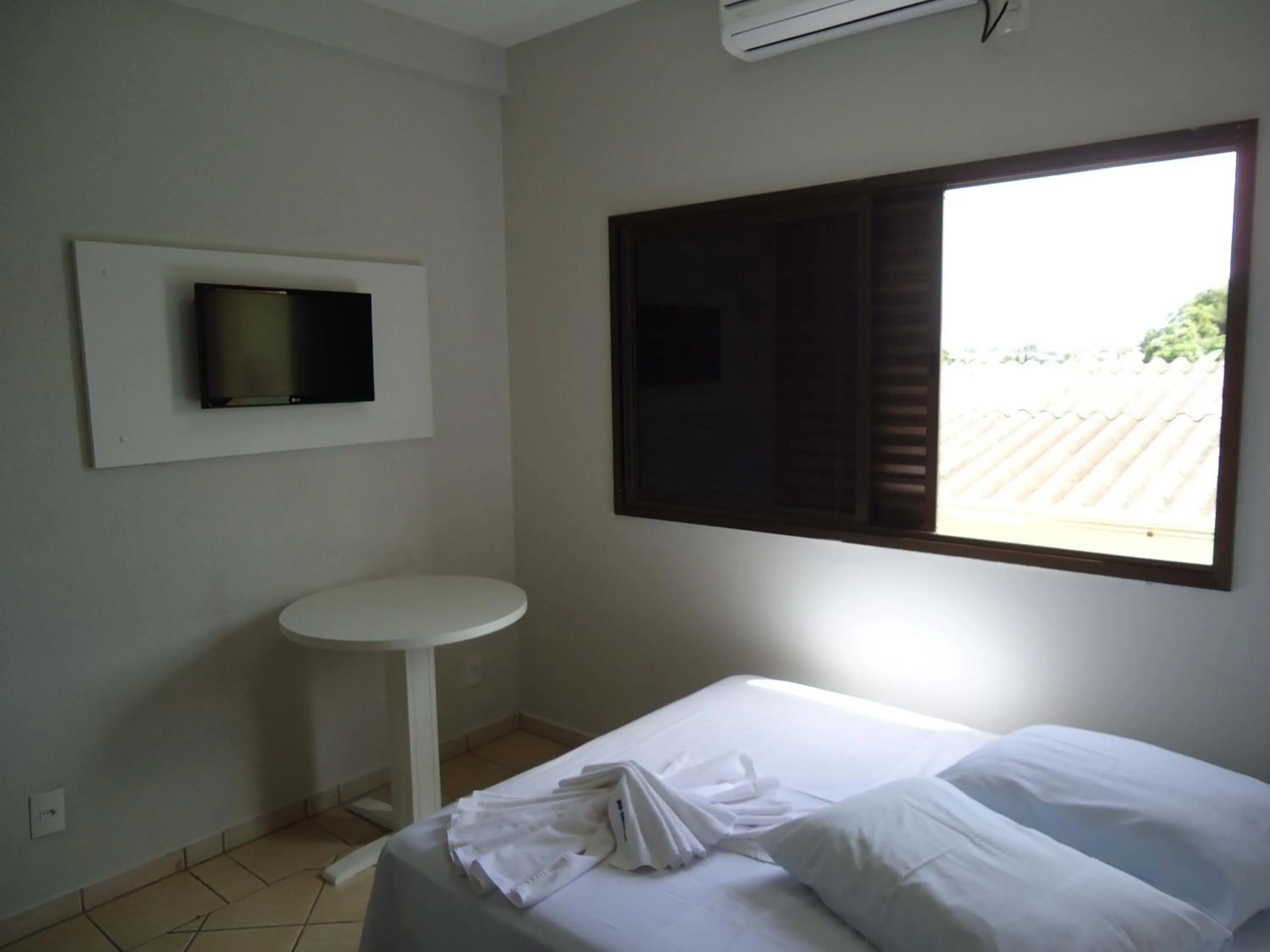 Bed in Big Executive Hotel