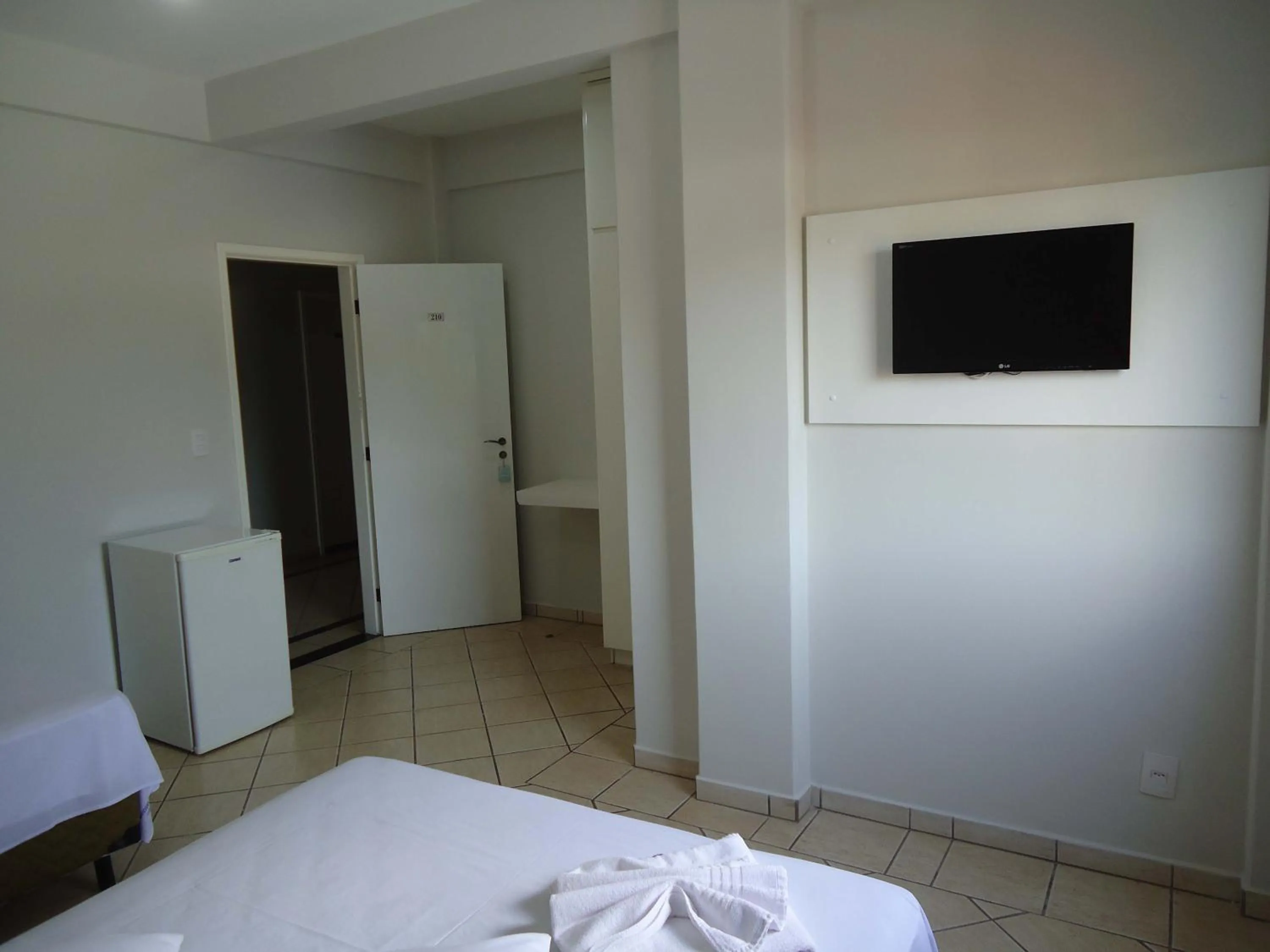 Bed in Big Executive Hotel