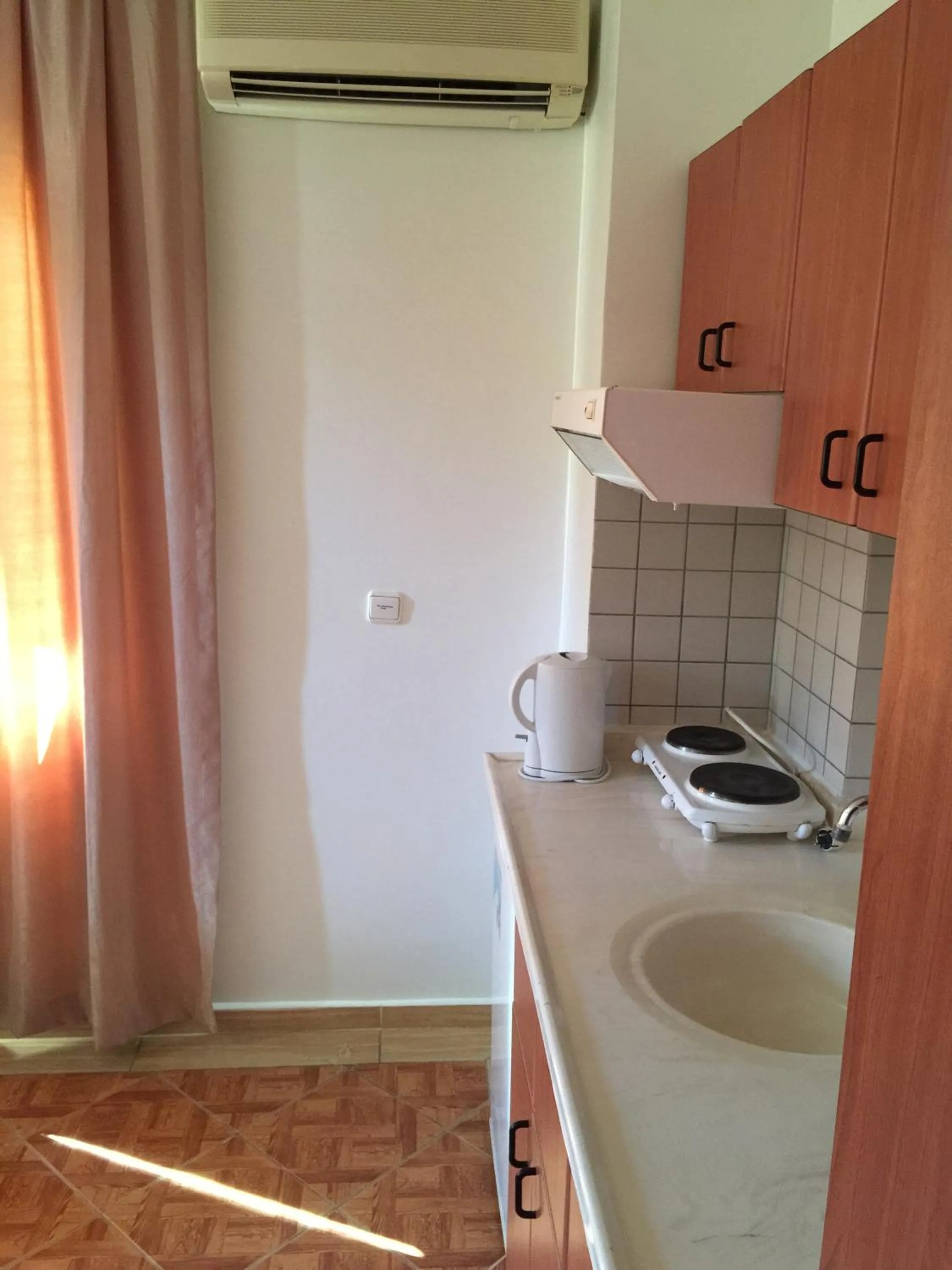 Kitchen or kitchenette in Blue Yacht Marina Apart Hotel