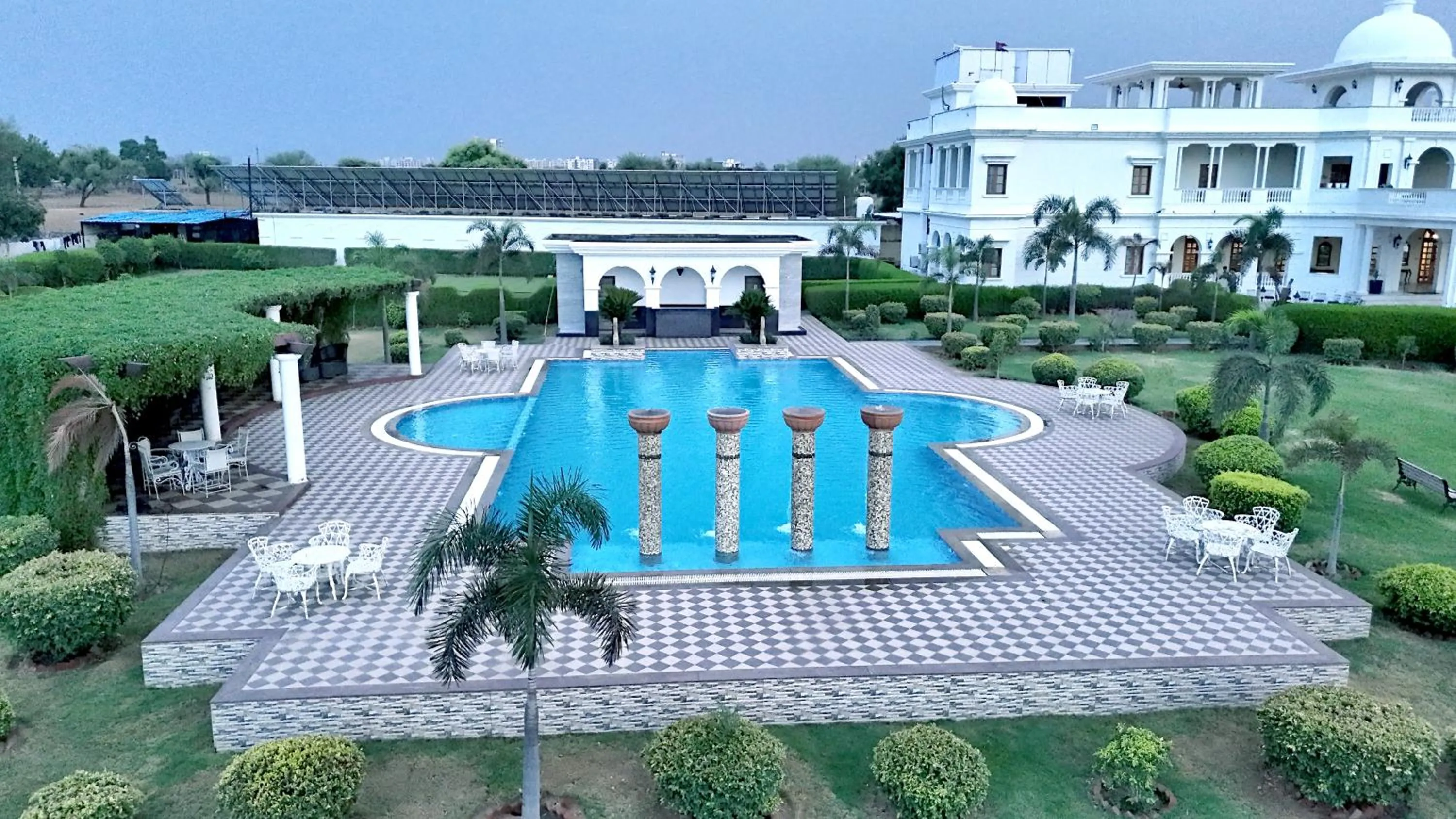 Swimming pool in Umaid Farm Resort- A Legancy Vintage Stay In Jaipur