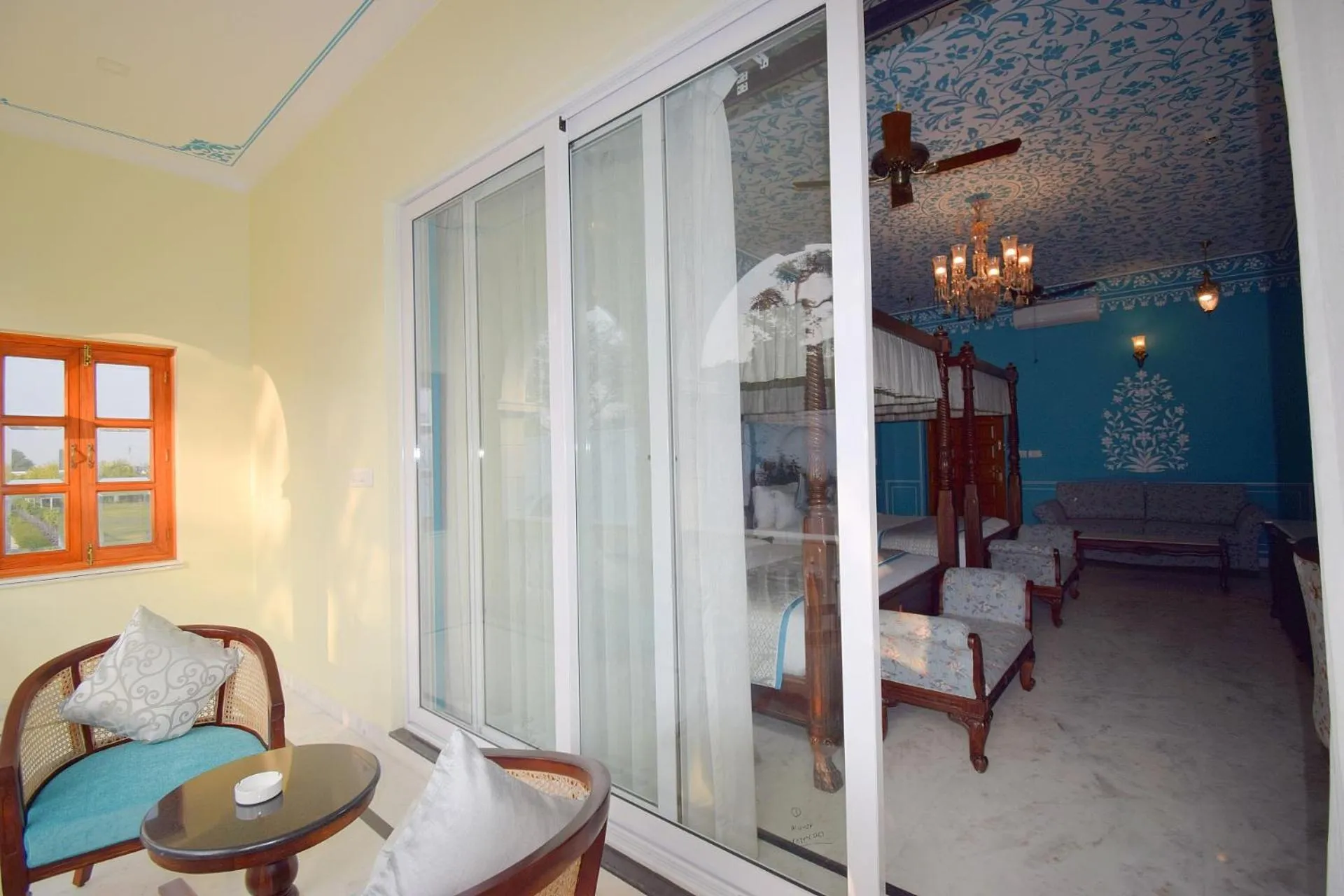 Seating area, Bed in Umaid Farm Resort- A Legancy Vintage Stay In Jaipur