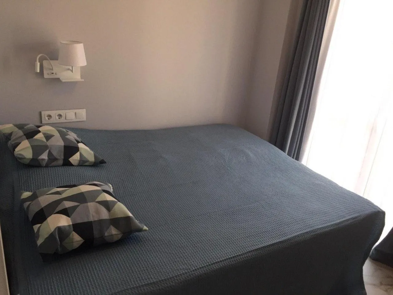 Bed in Nuevo Luminoso Apartamento Catalina a 80 metros de la playa para 4 personas