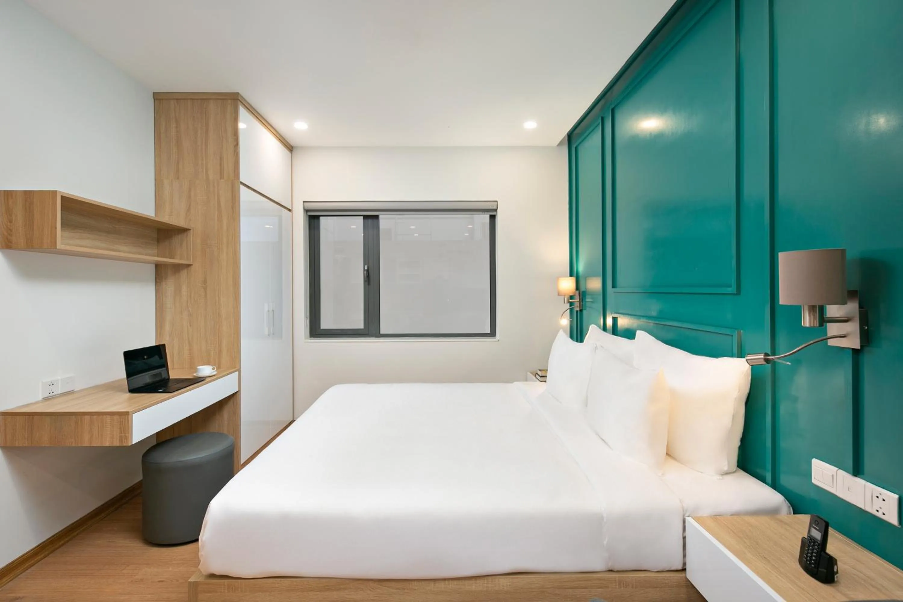 Bed in Dolphin Hotel and Apartment