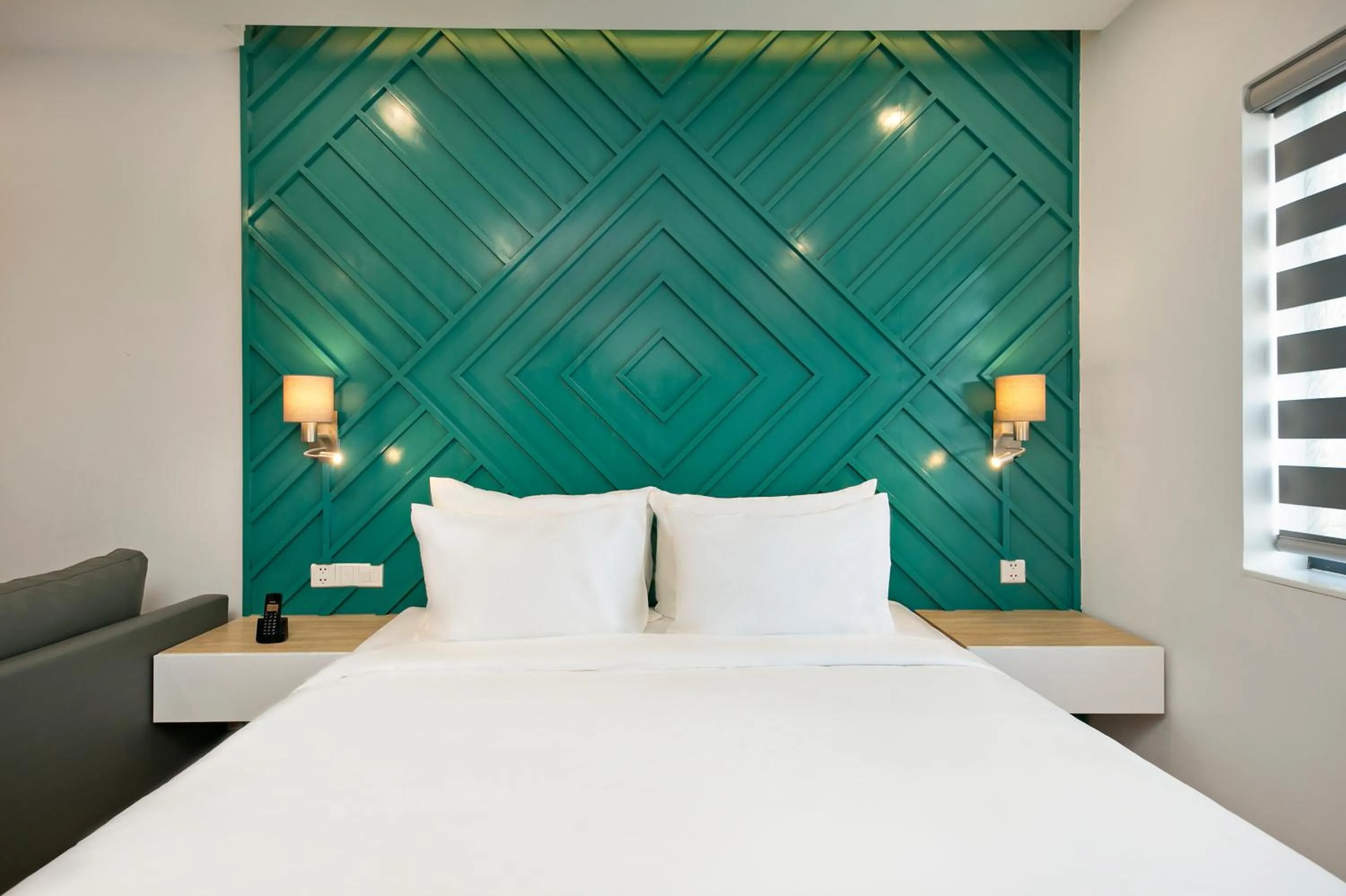 Bed in Dolphin Hotel and Apartment