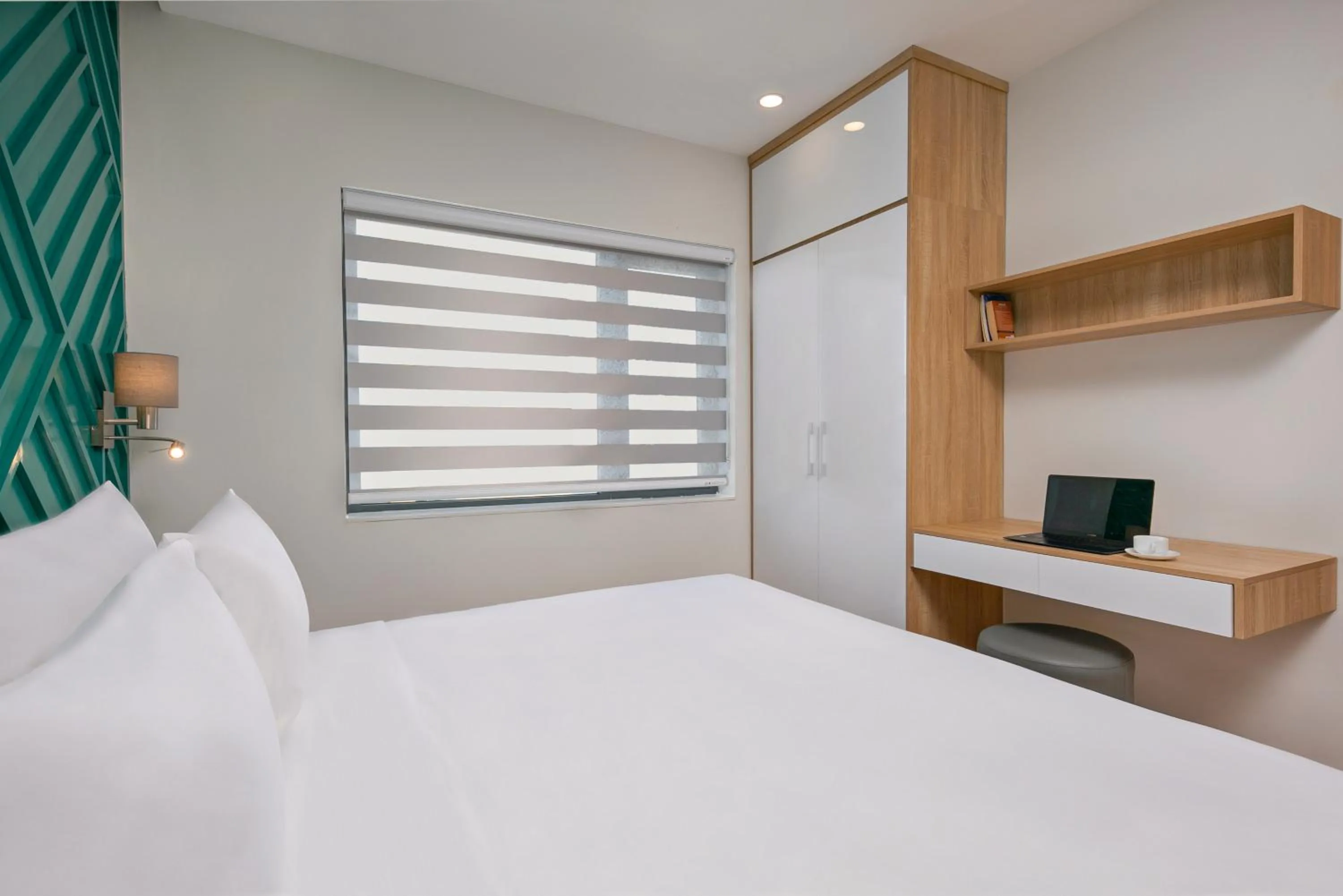 Bed in Dolphin Hotel and Apartment