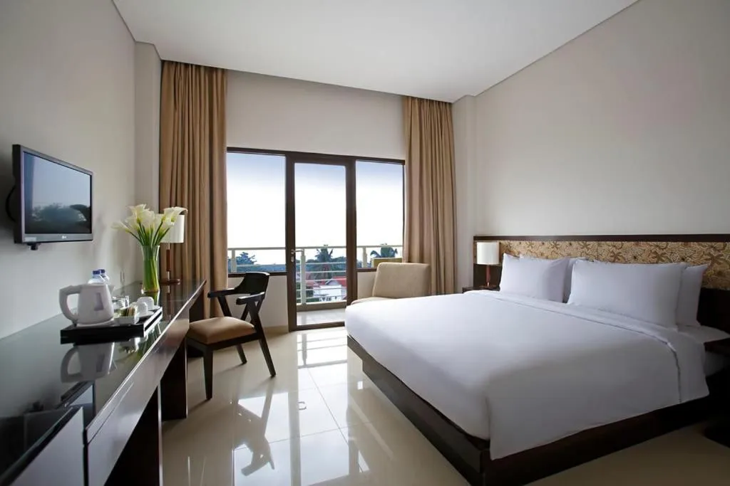 Bed in Hotel Surya Yudha Purwokerto