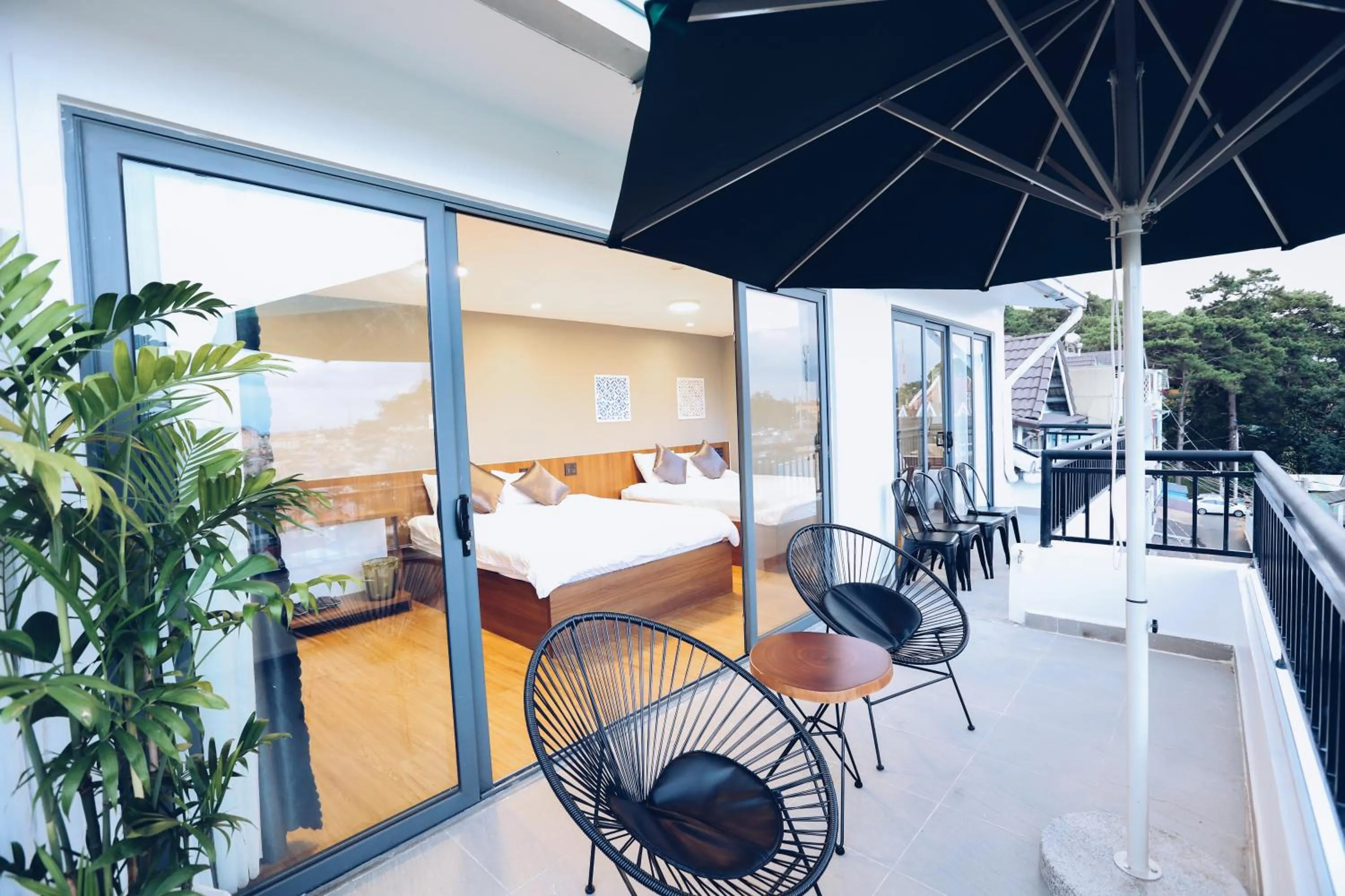 Bed in TTR Studio Apart Hotel