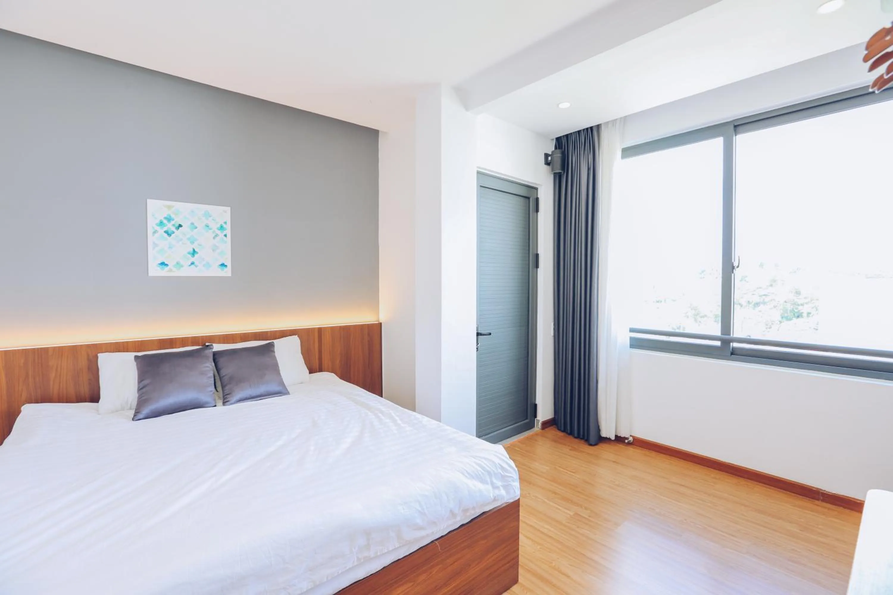 Bed in TTR Studio Apart Hotel