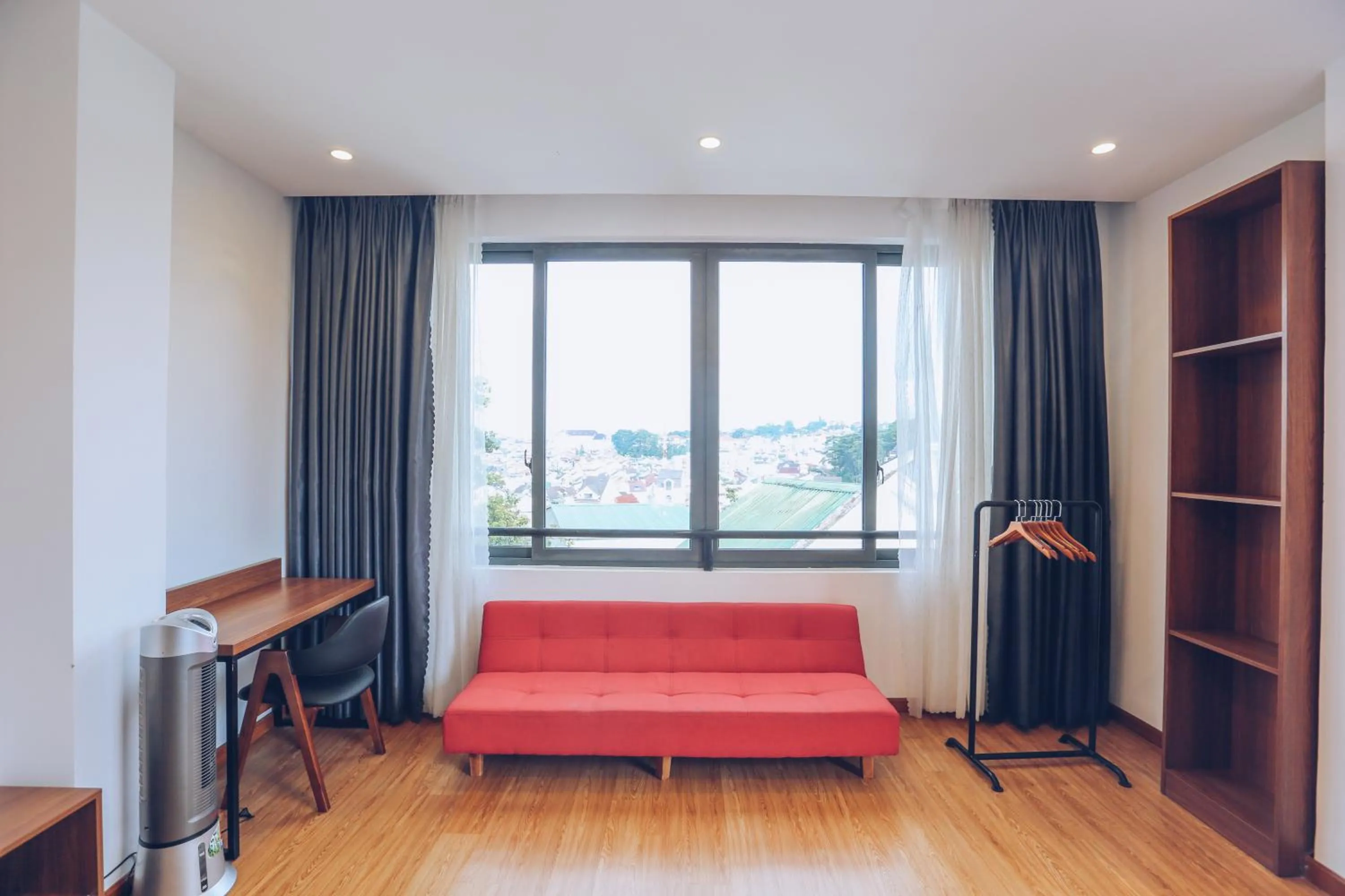 Bed in TTR Studio Apart Hotel