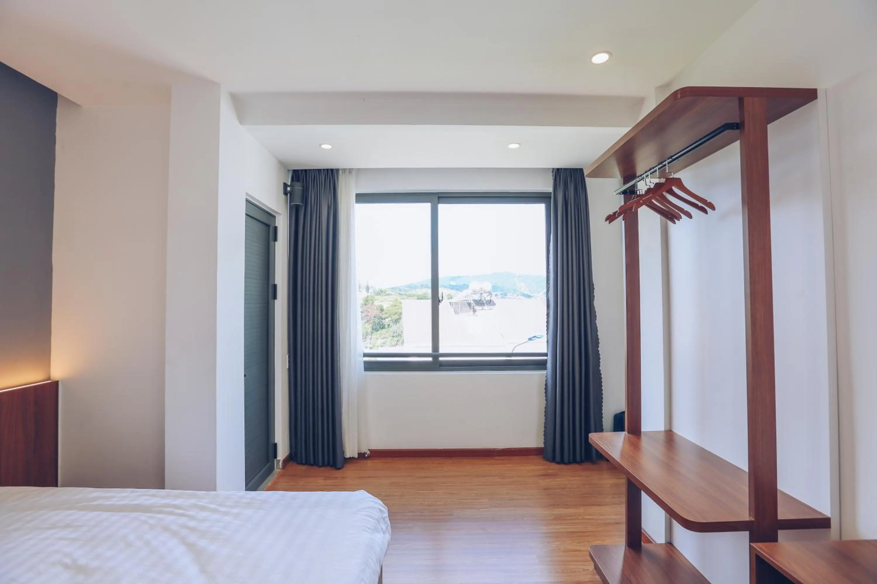 Bed in TTR Studio Apart Hotel