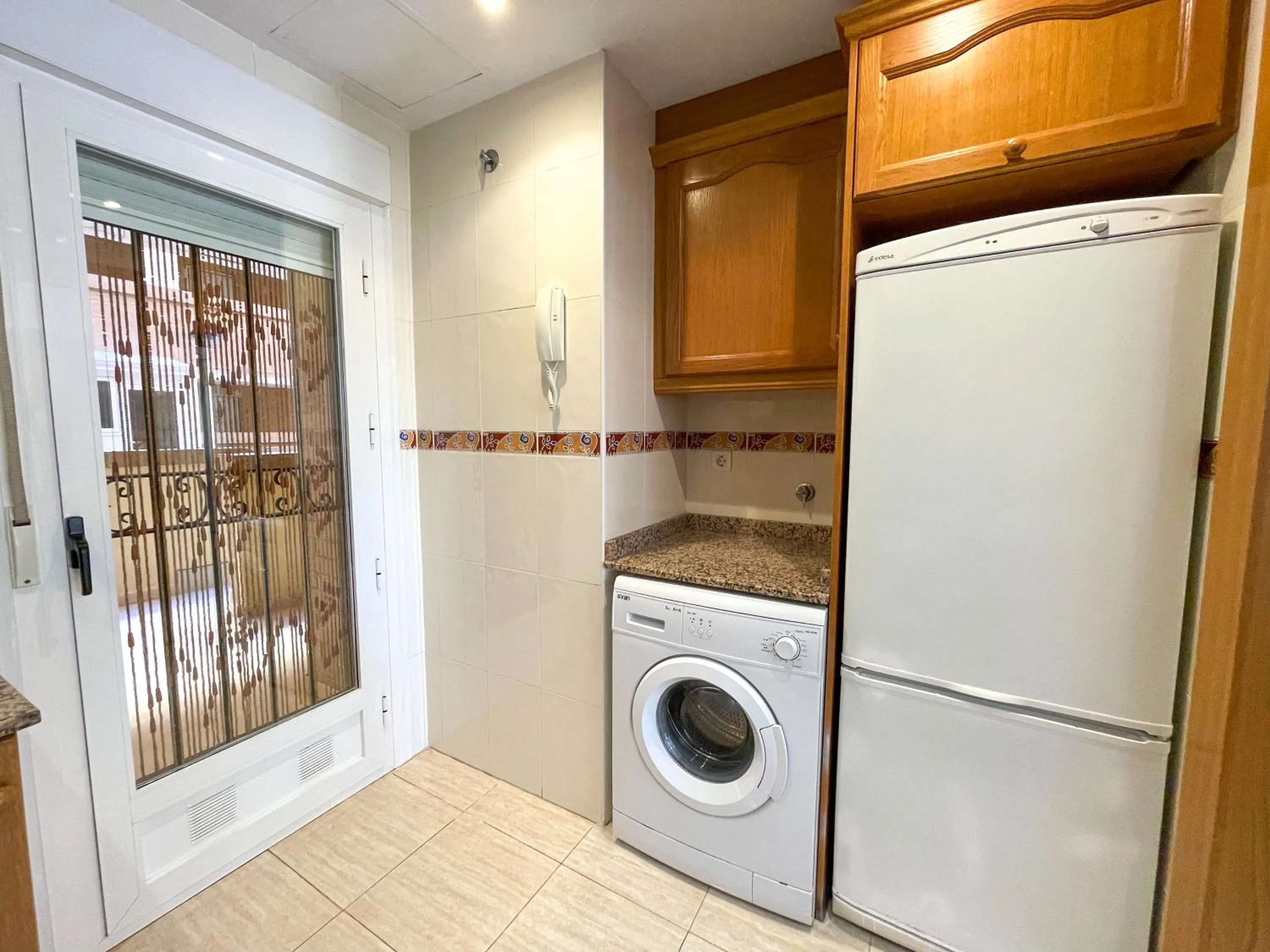 Kitchen or kitchenette in Apartamentos Caribe Marina D’Or 3000