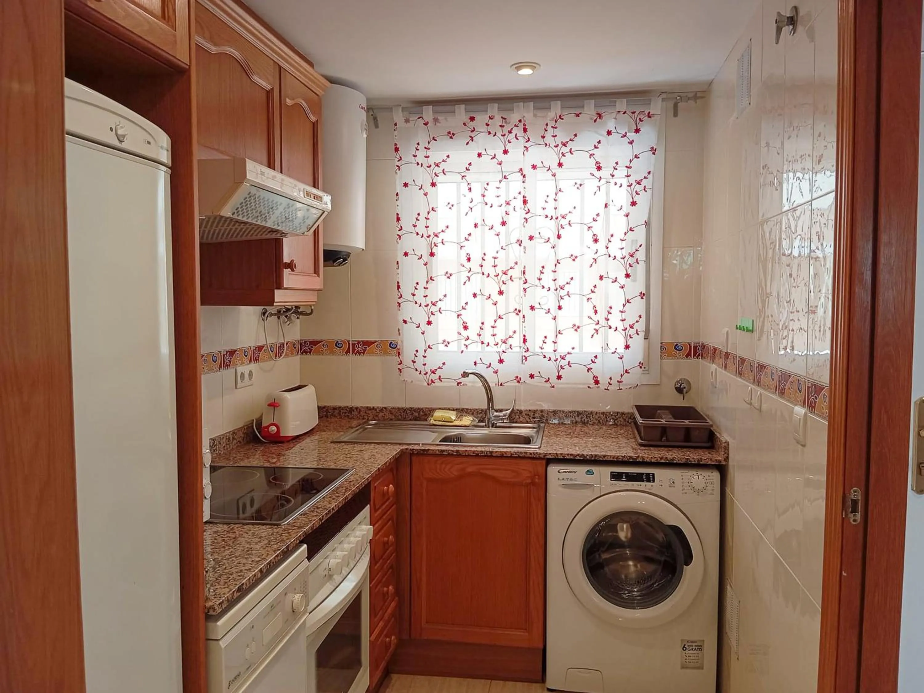 washing machine in Apartamentos Caribe Marina D’Or 3000