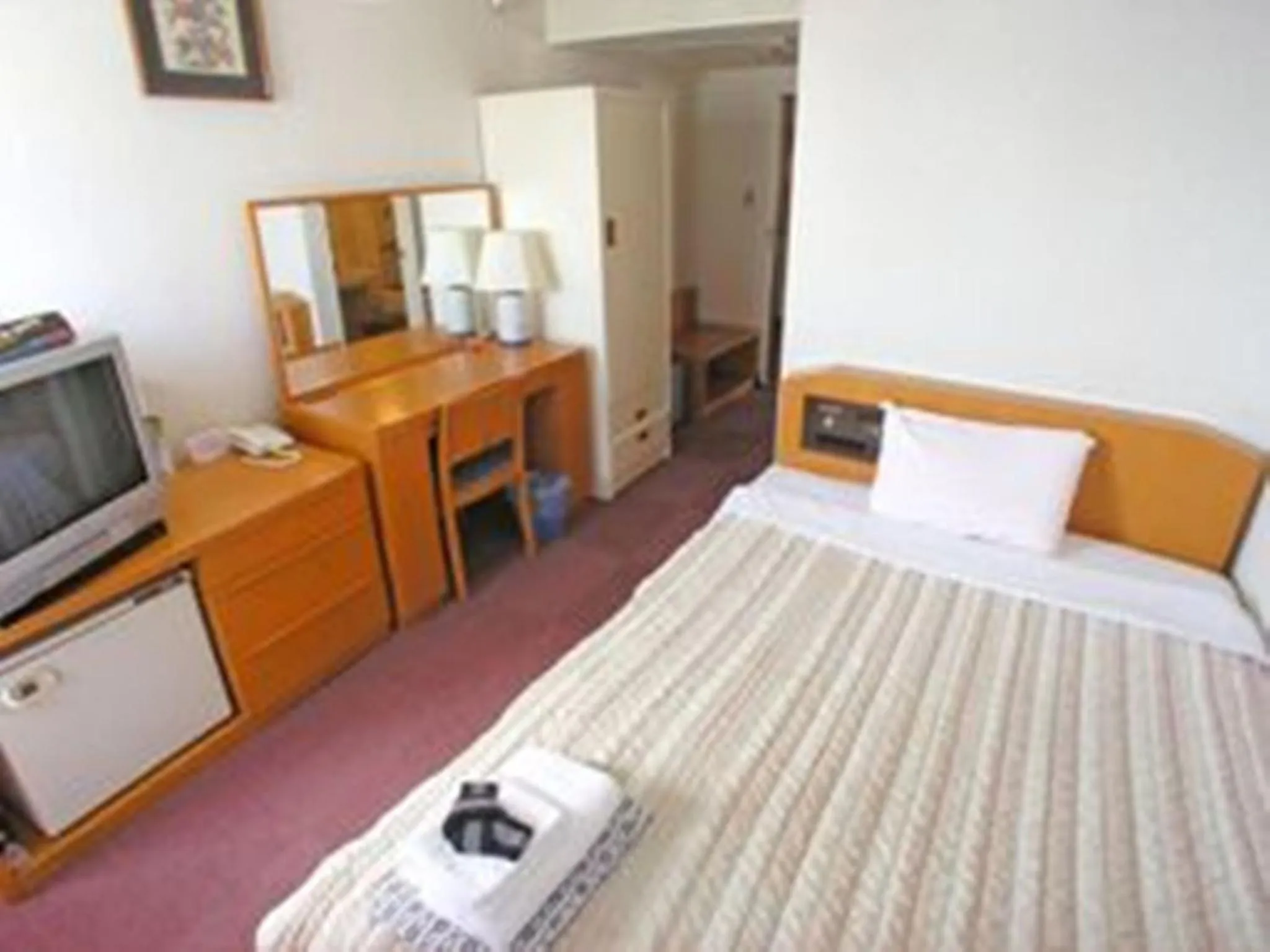 Photo of the whole room, Bed in Okinawa Hotel Continental