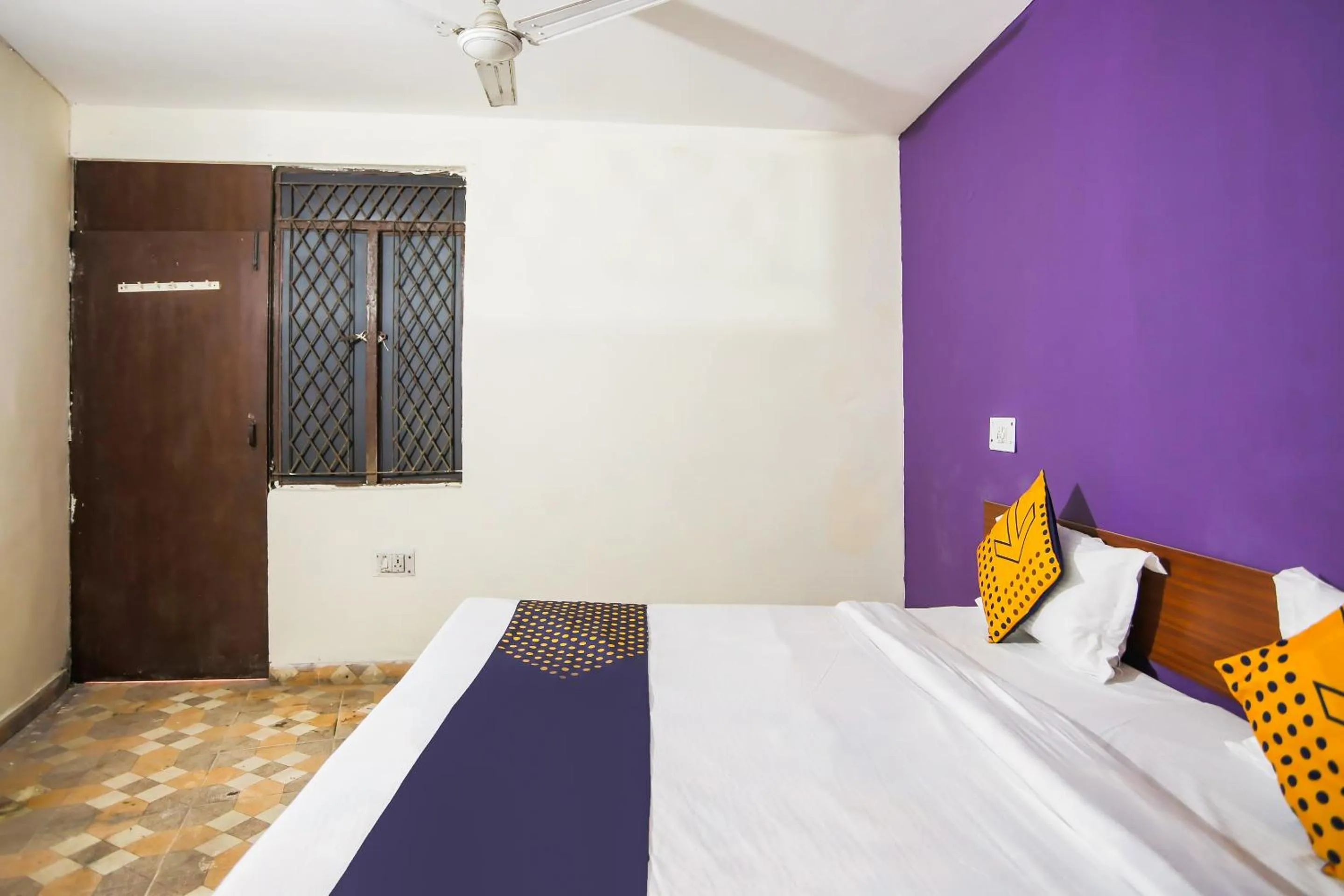 Bedroom, Bed in SPOT ON Hotel Harry's 1 Near Select Citywalk Mall