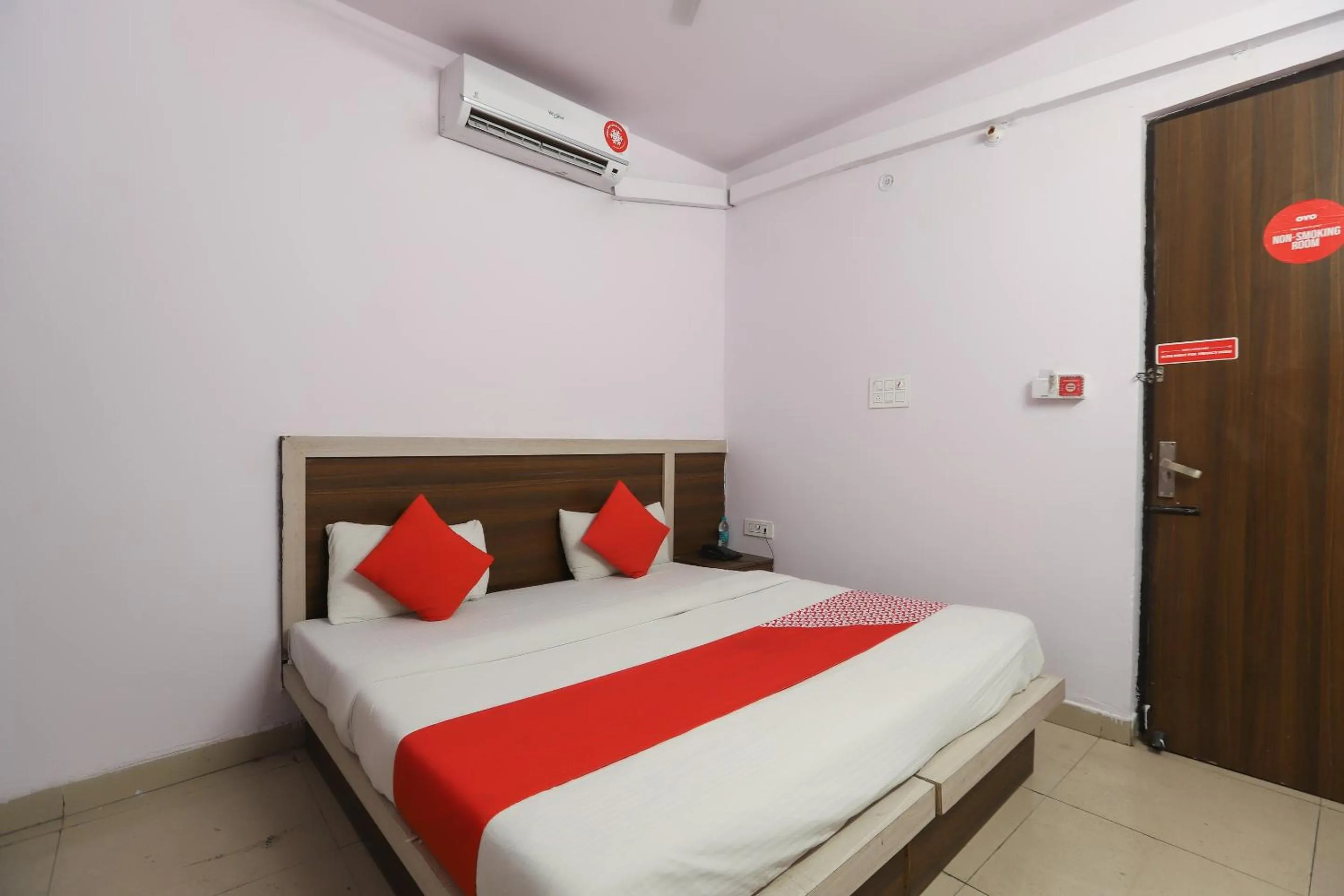 Bedroom in Hotel O Noida Villa