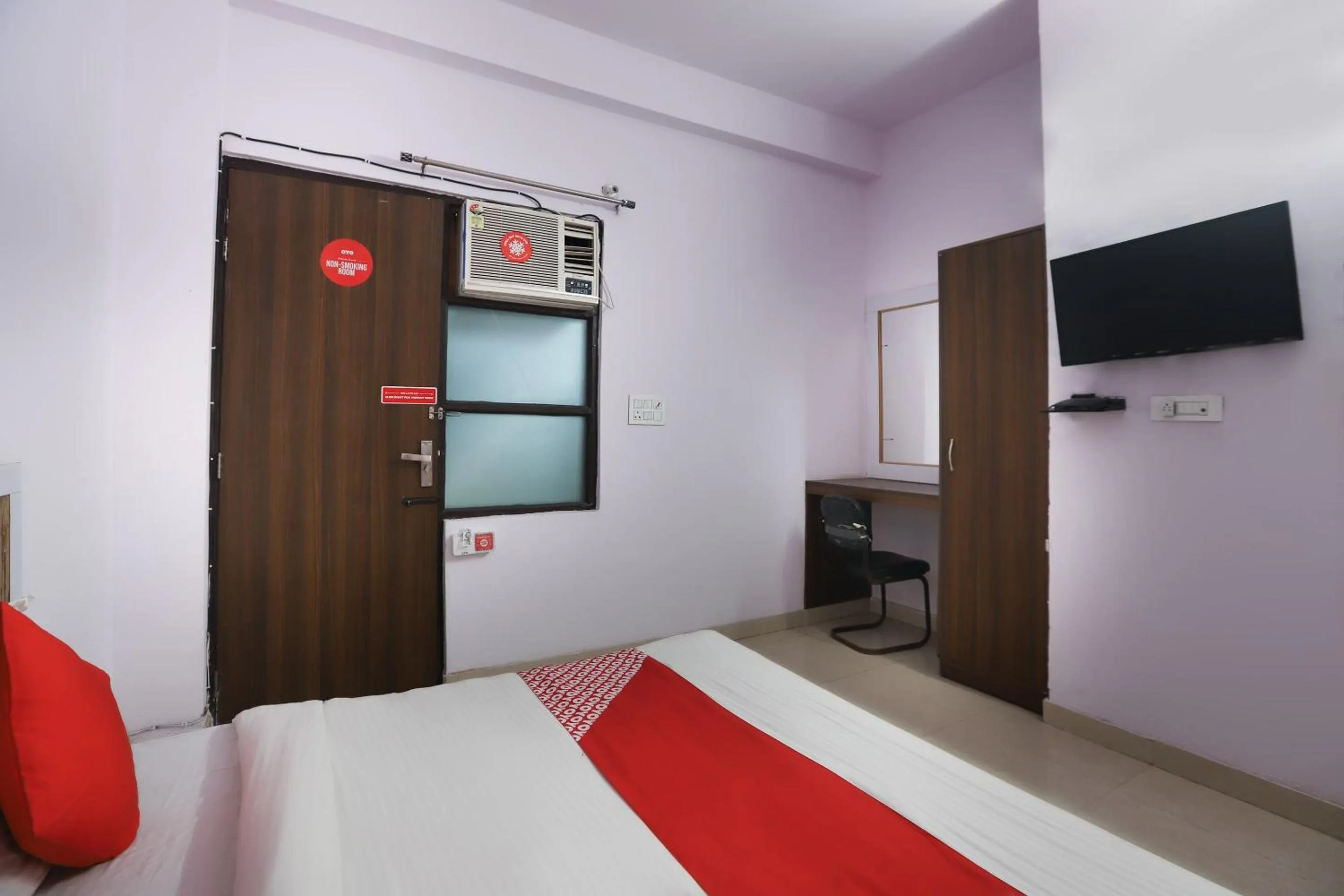 Bedroom in Hotel O Noida Villa