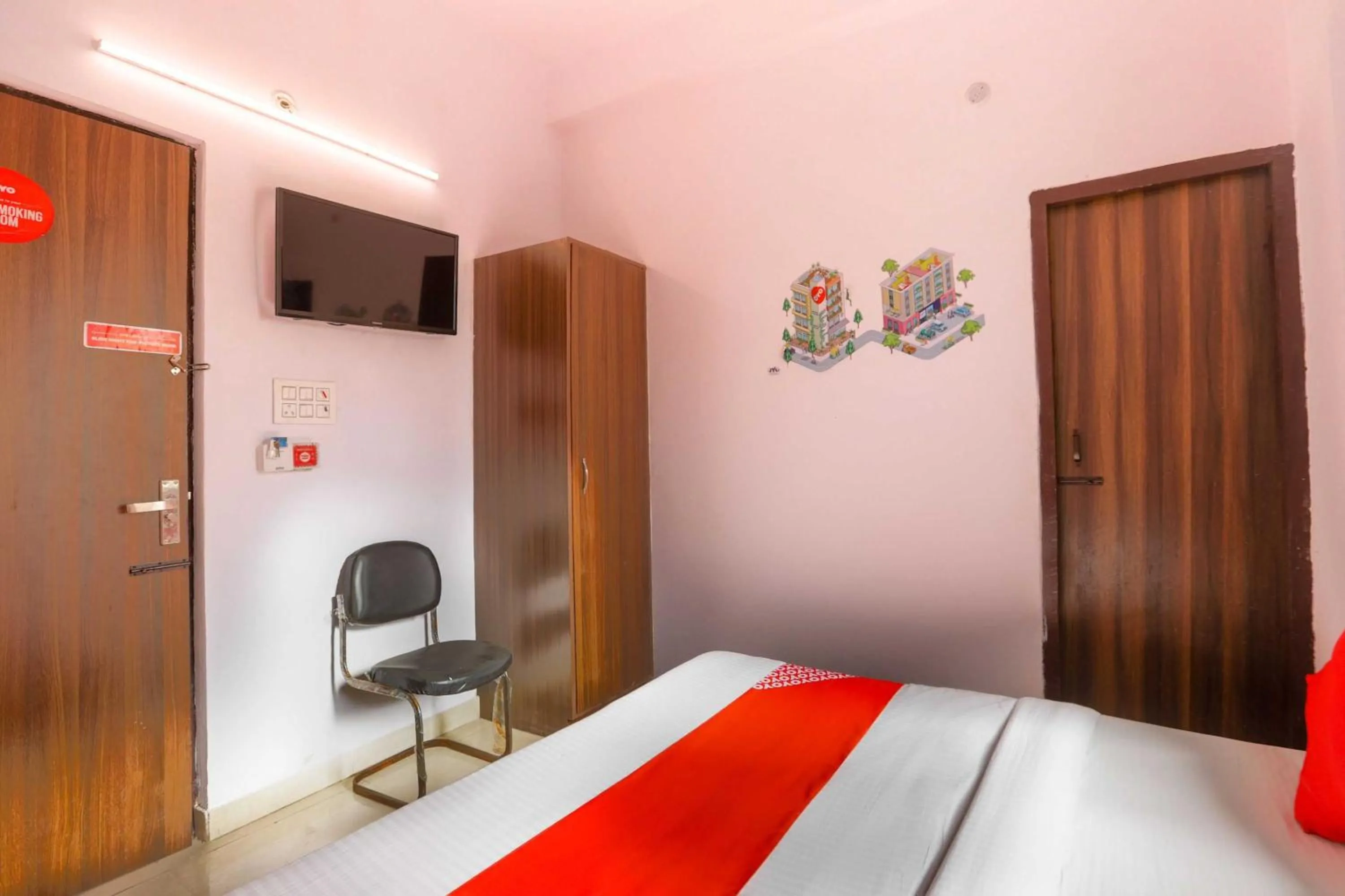 Bedroom in Hotel O Noida Villa