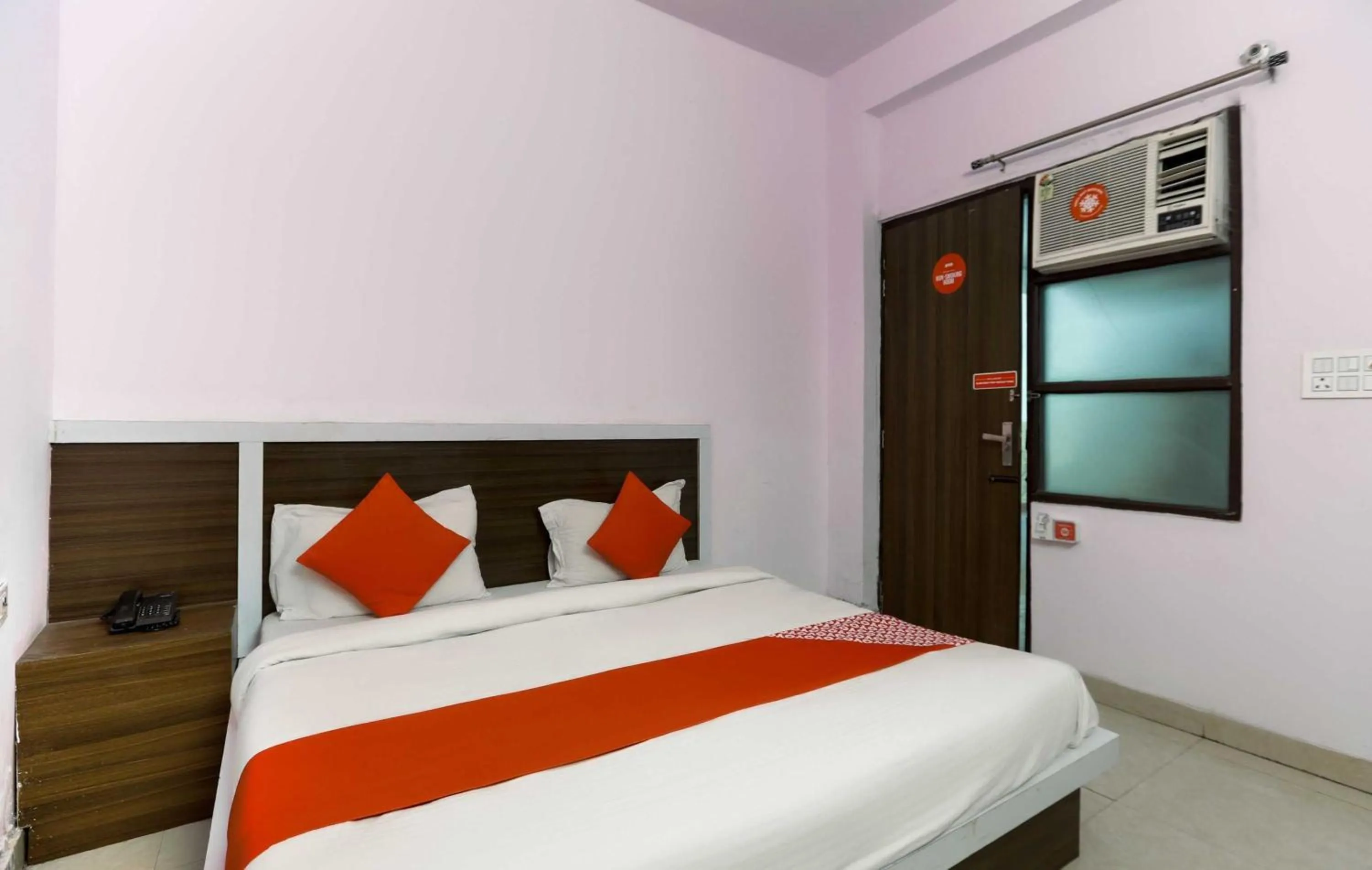 Bedroom in Hotel O Noida Villa