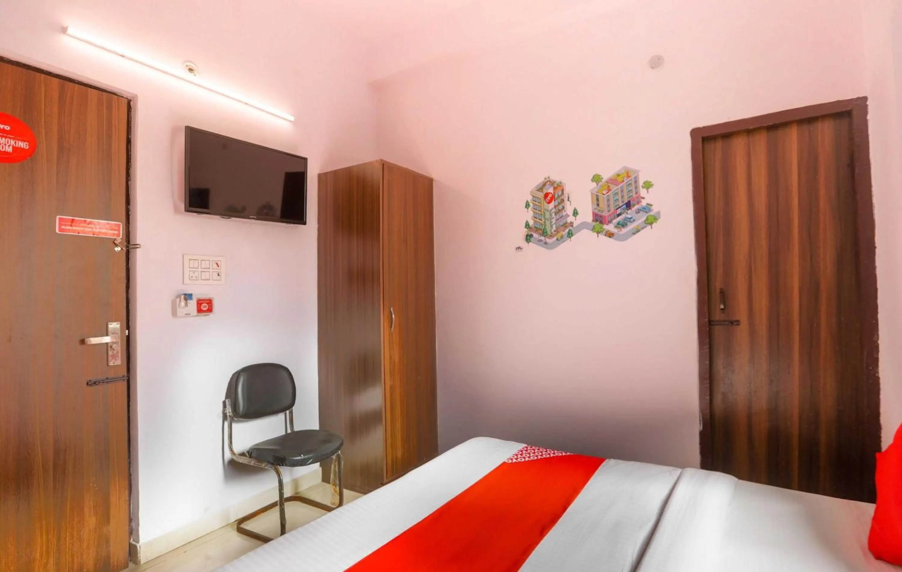 Bedroom in Hotel O Noida Villa