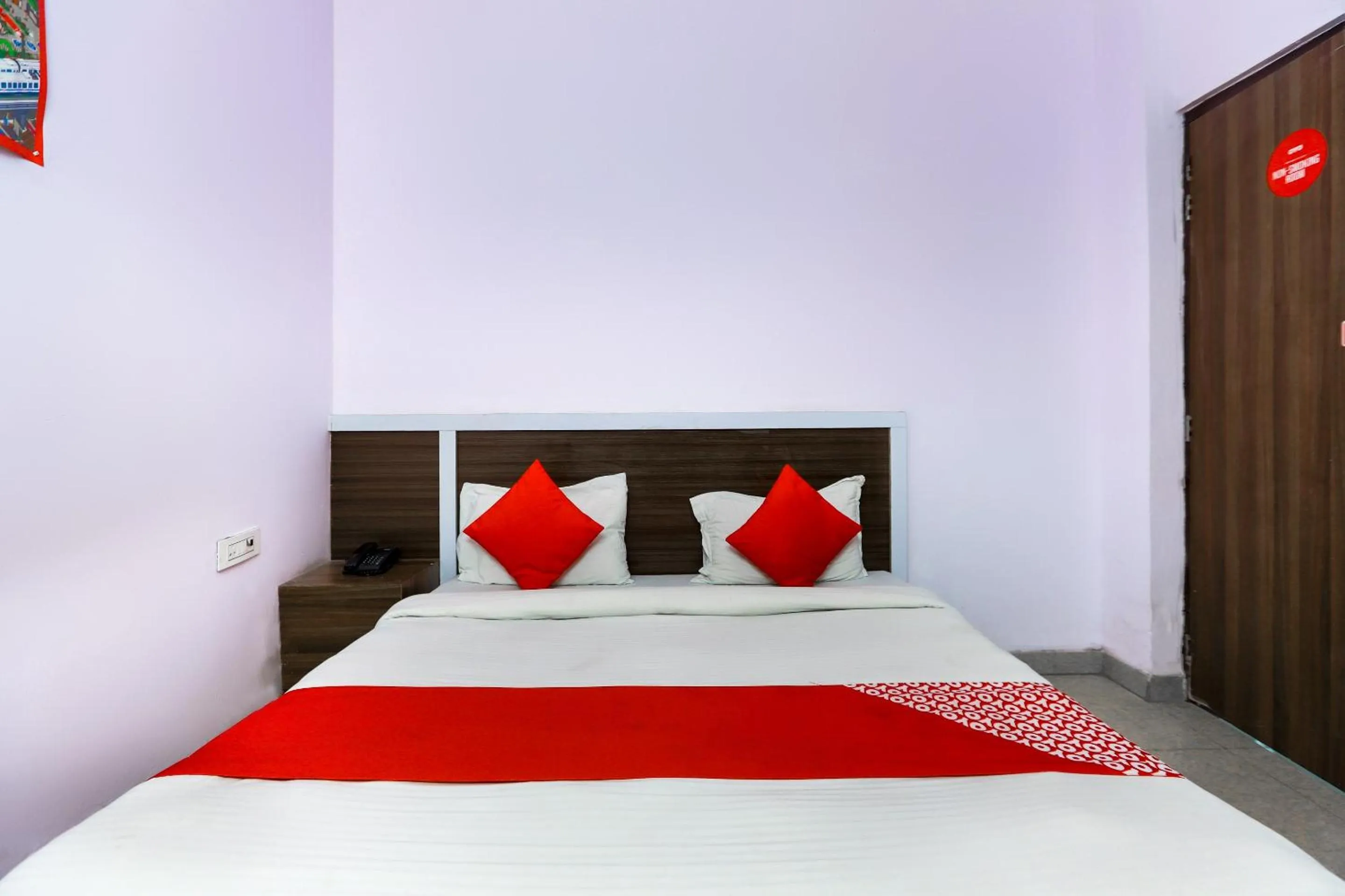 Bedroom in Hotel O Noida Villa