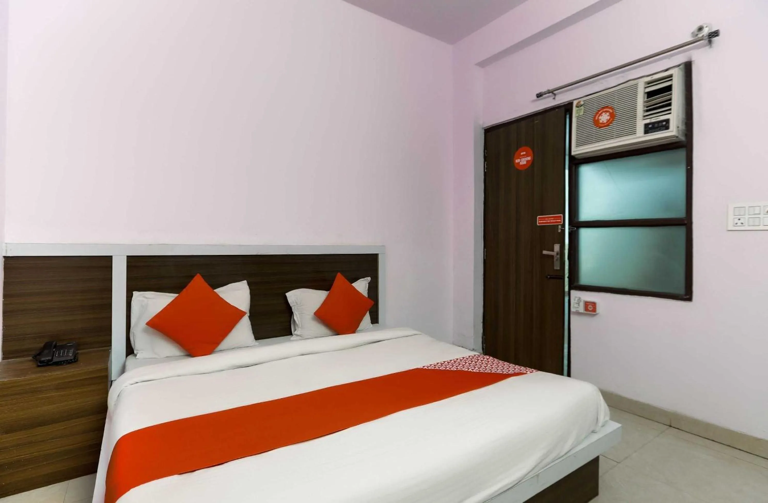 Bedroom in Hotel O Noida Villa