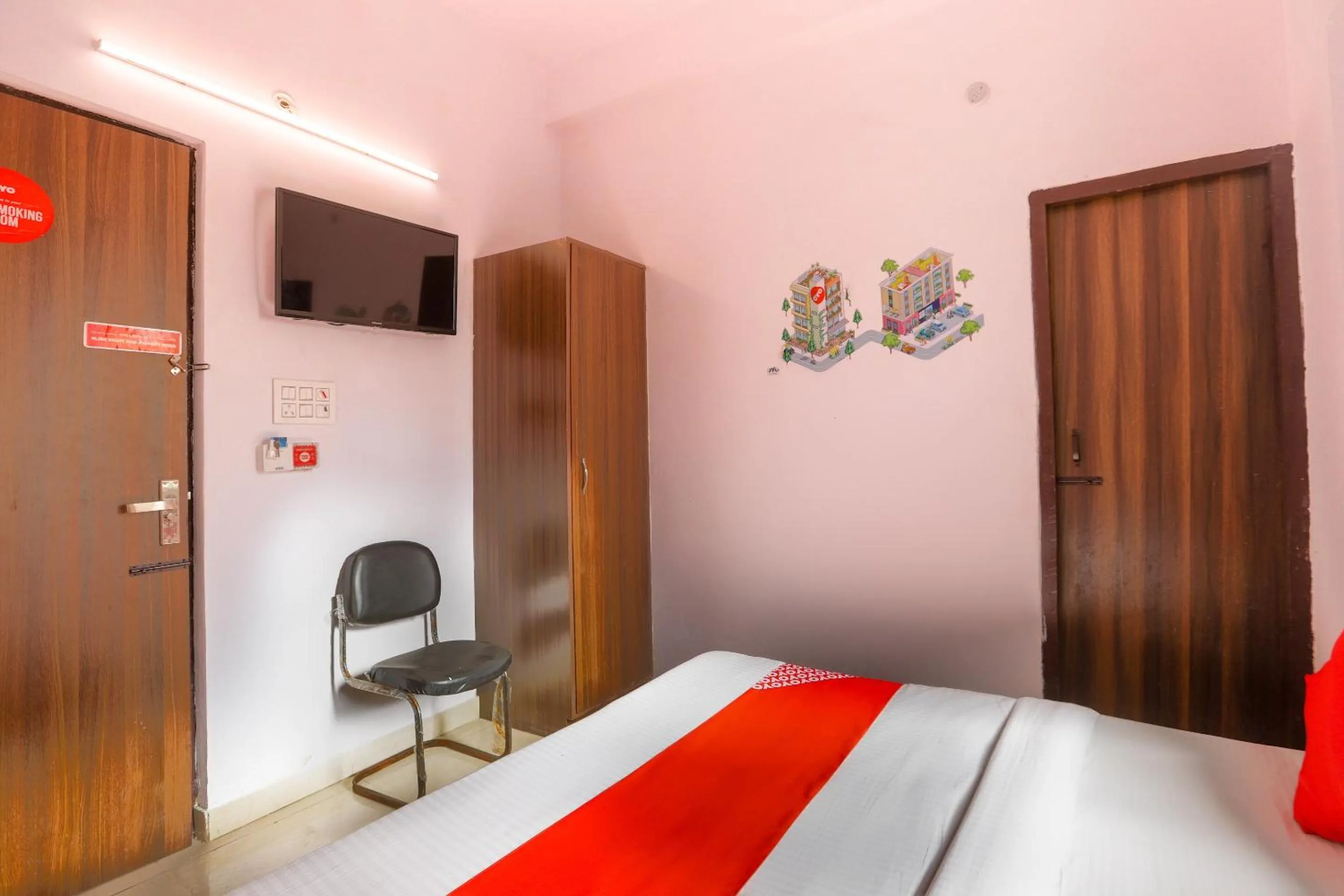 Bedroom in Hotel O Noida Villa