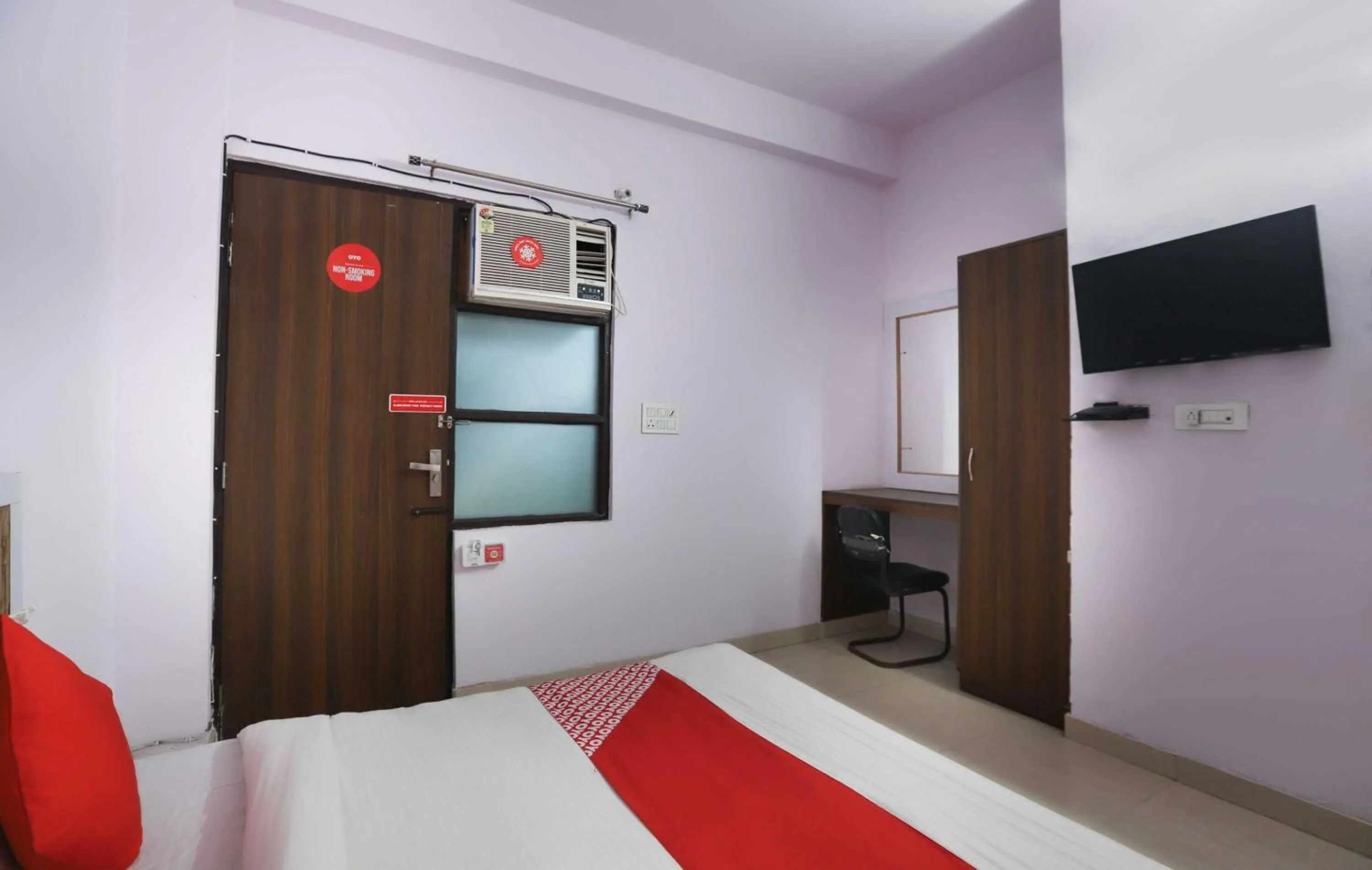 Bedroom in Hotel O Noida Villa