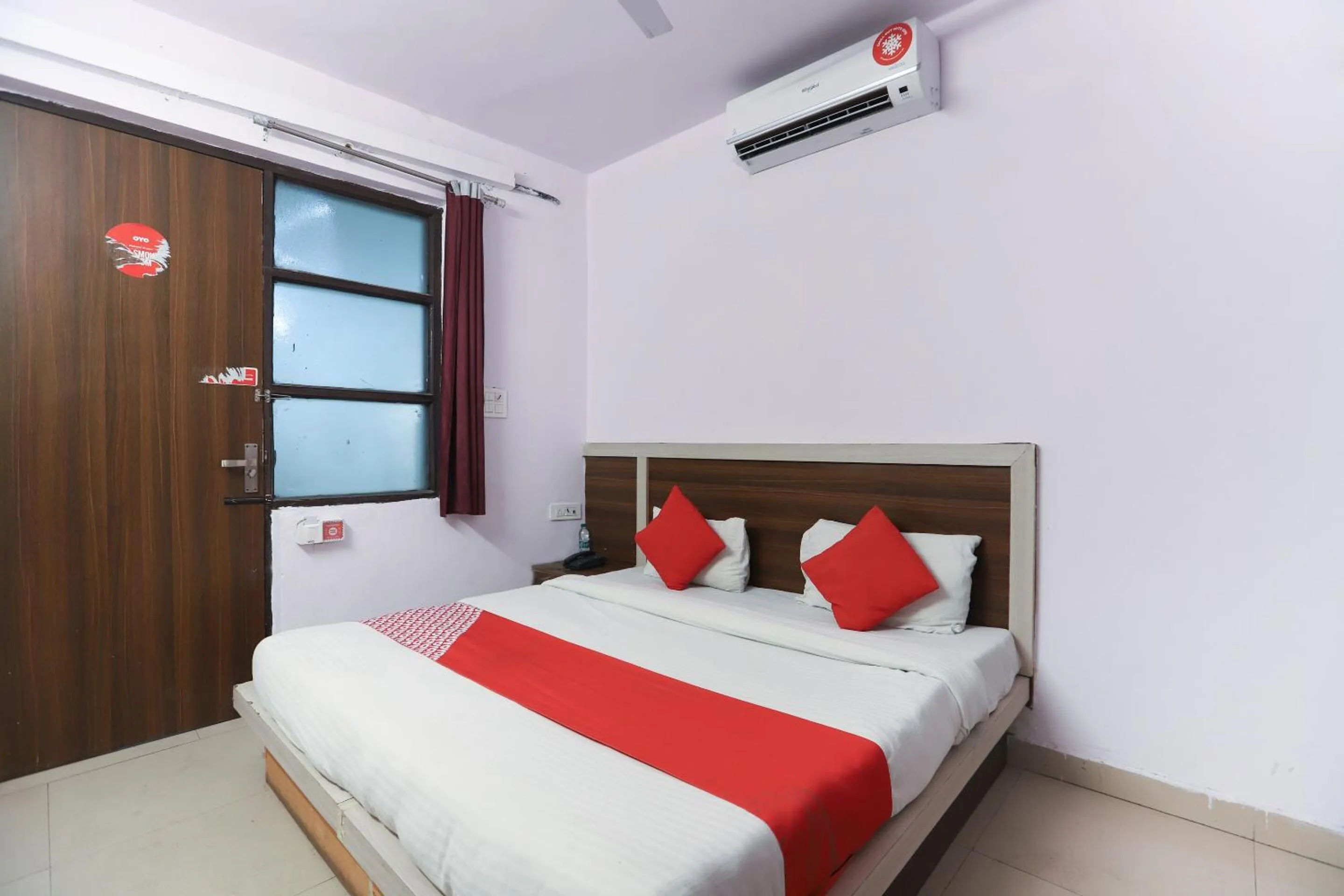 Bedroom in Hotel O Noida Villa