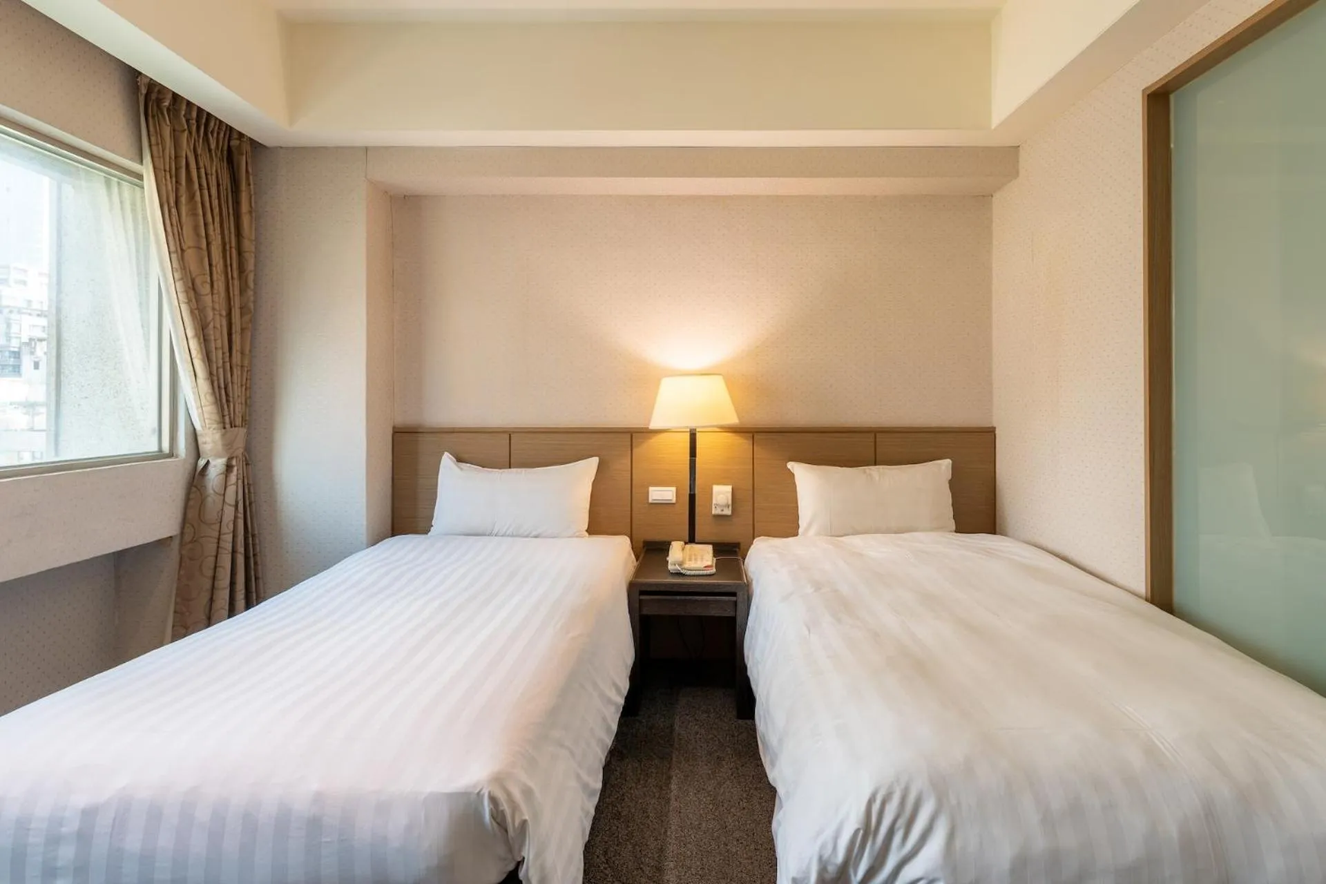 Bed in Guide Hotel Taipei Chongqing