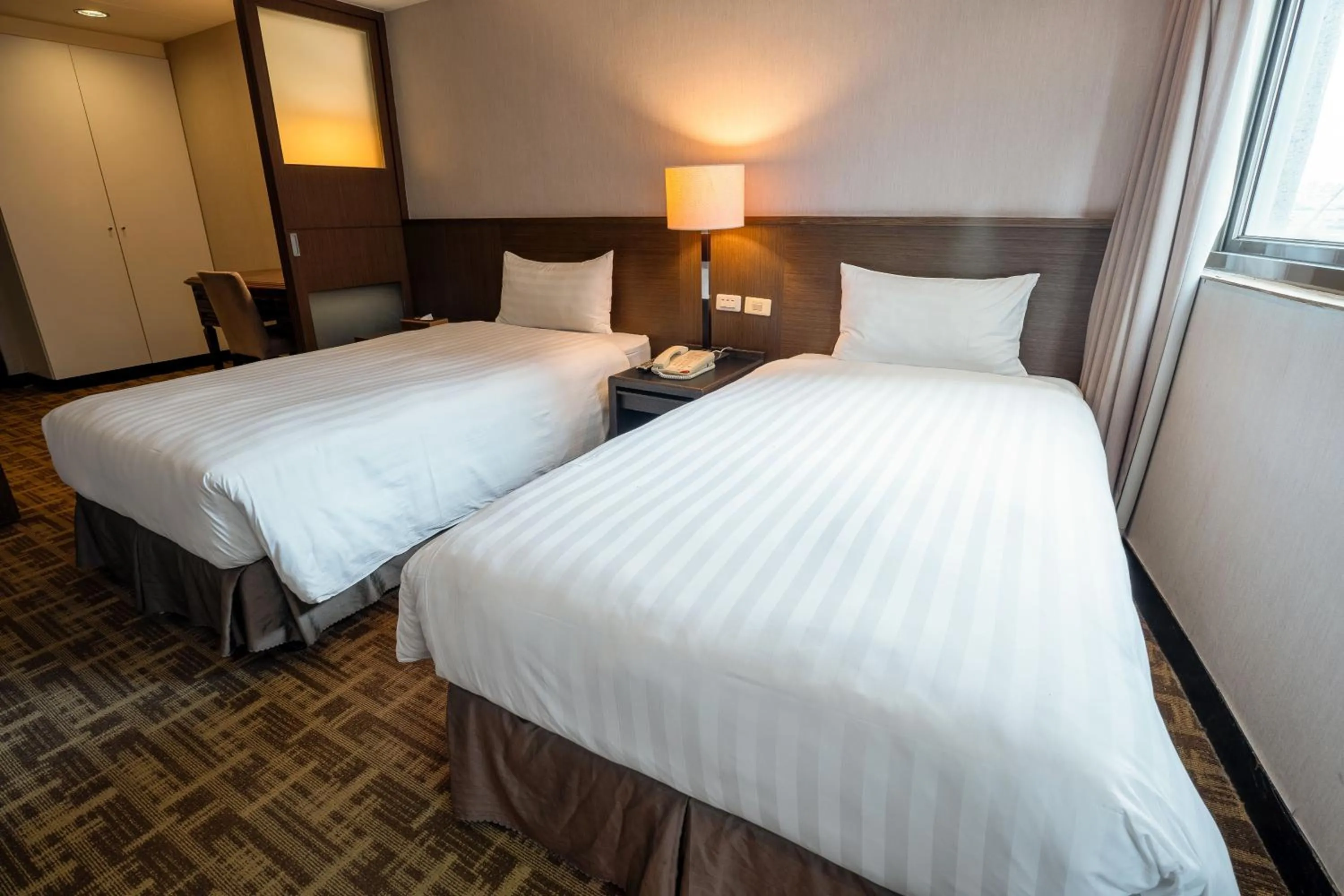 Bed in Guide Hotel Taipei Chongqing