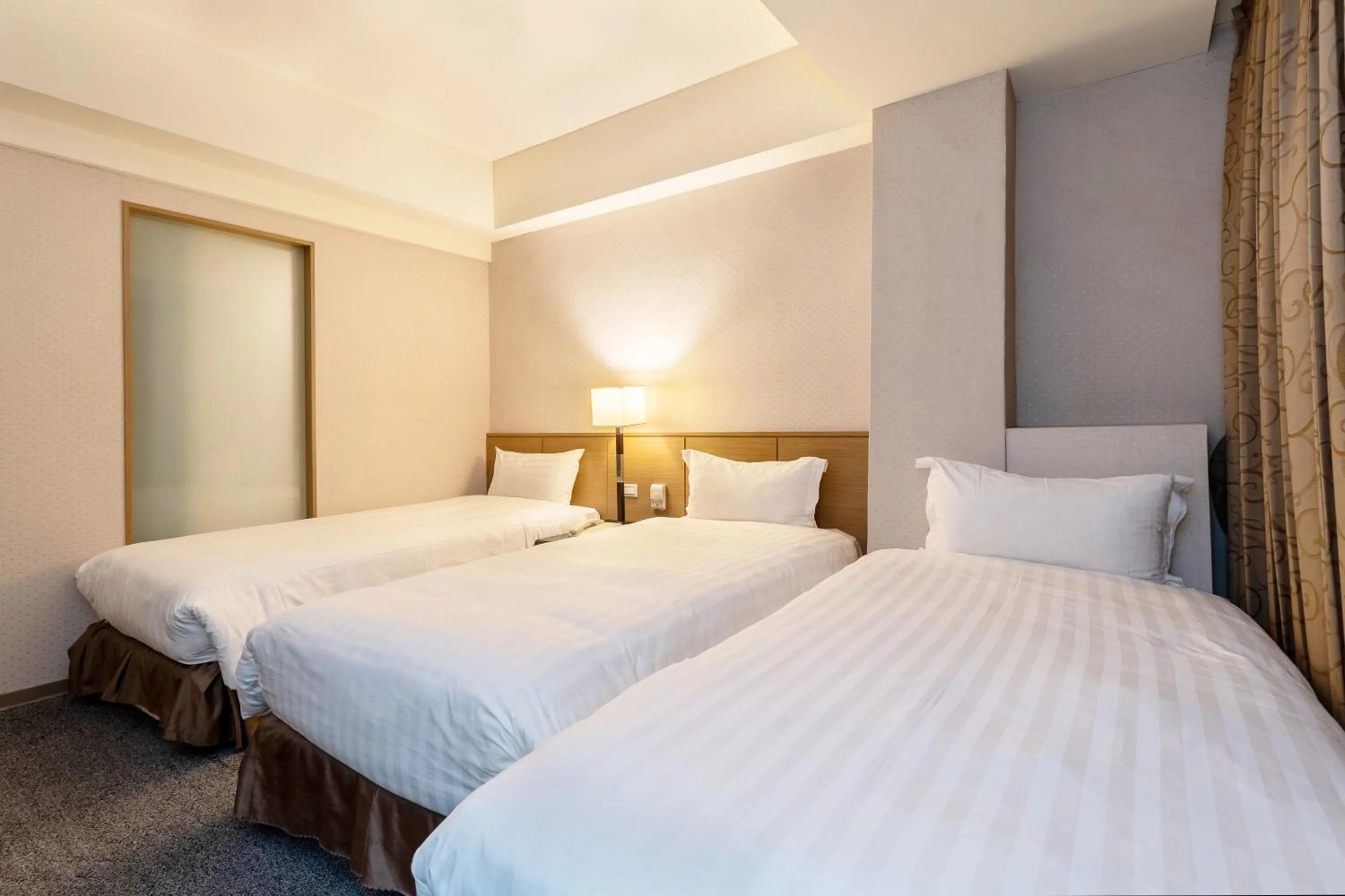 Bed in Guide Hotel Taipei Chongqing