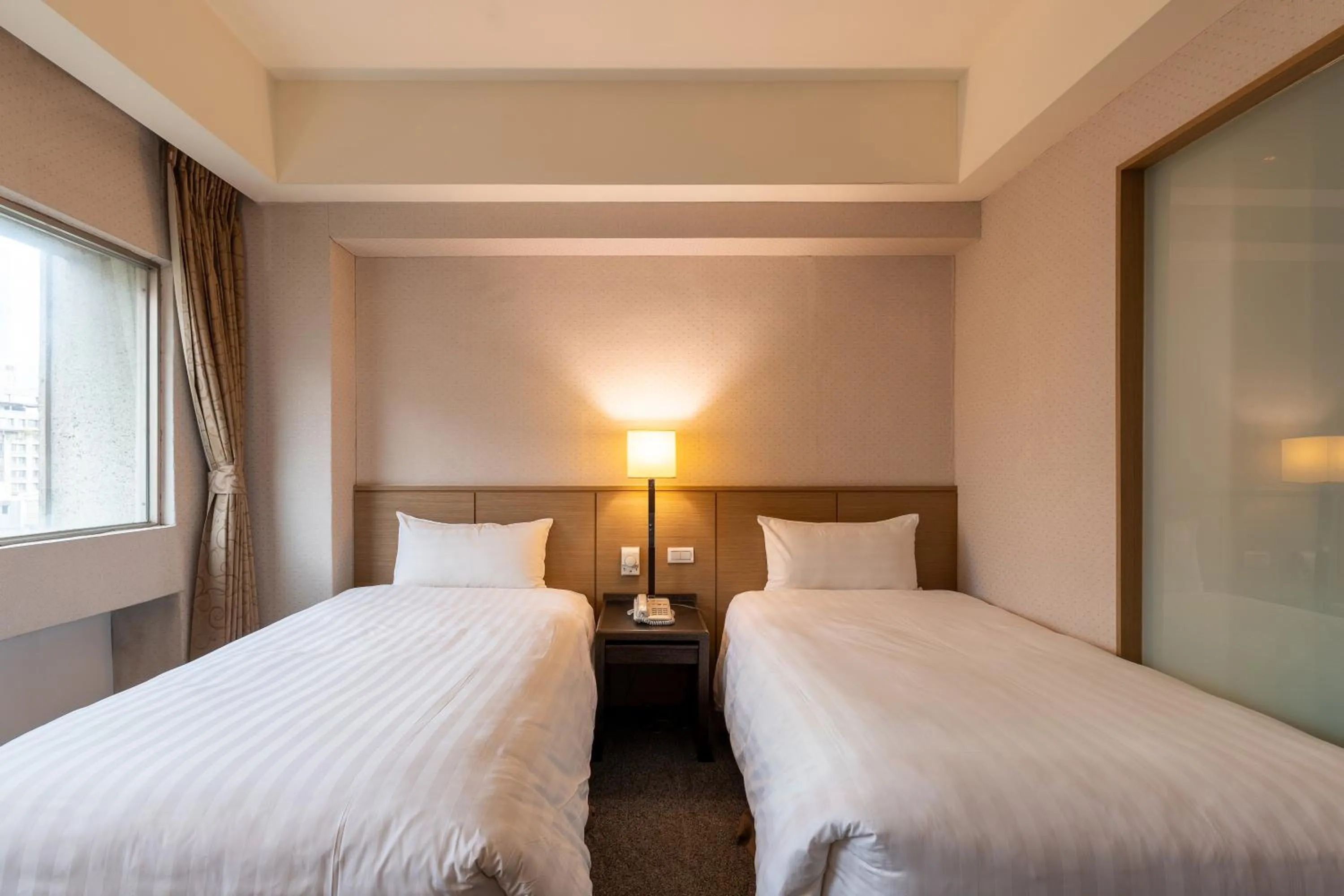 Bed in Guide Hotel Taipei Chongqing