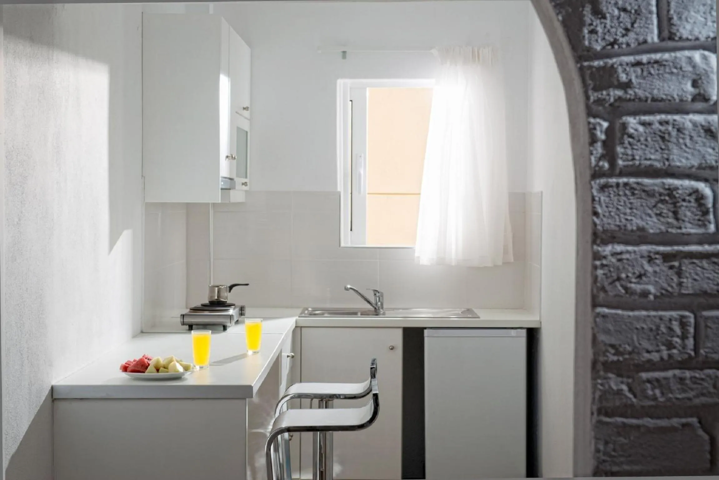 Kitchen or kitchenette in Fedra Boutique Apartments