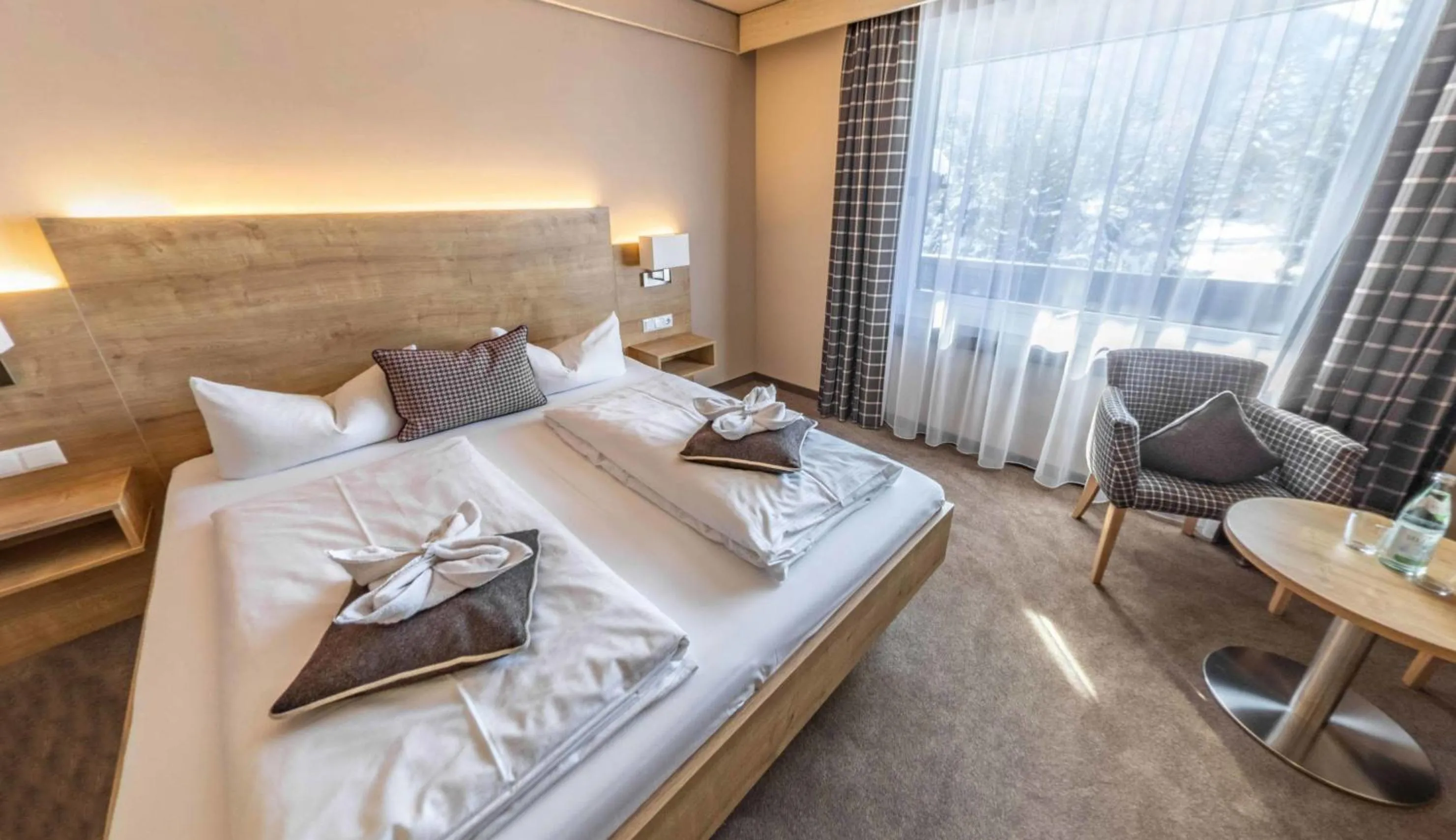 Photo of the whole room, Bed in Hotel Quellenhof