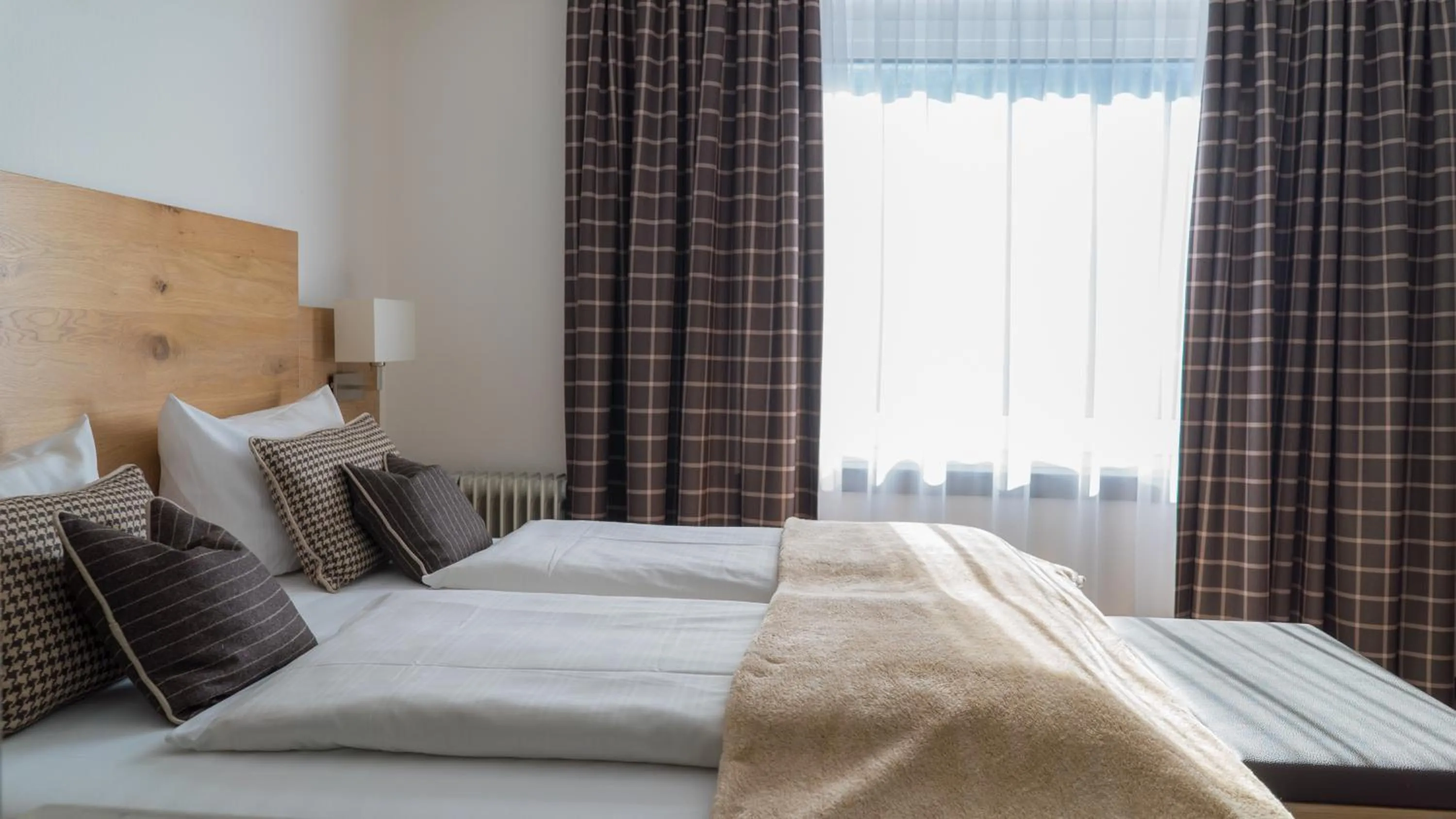 Photo of the whole room, Bed in Hotel Quellenhof