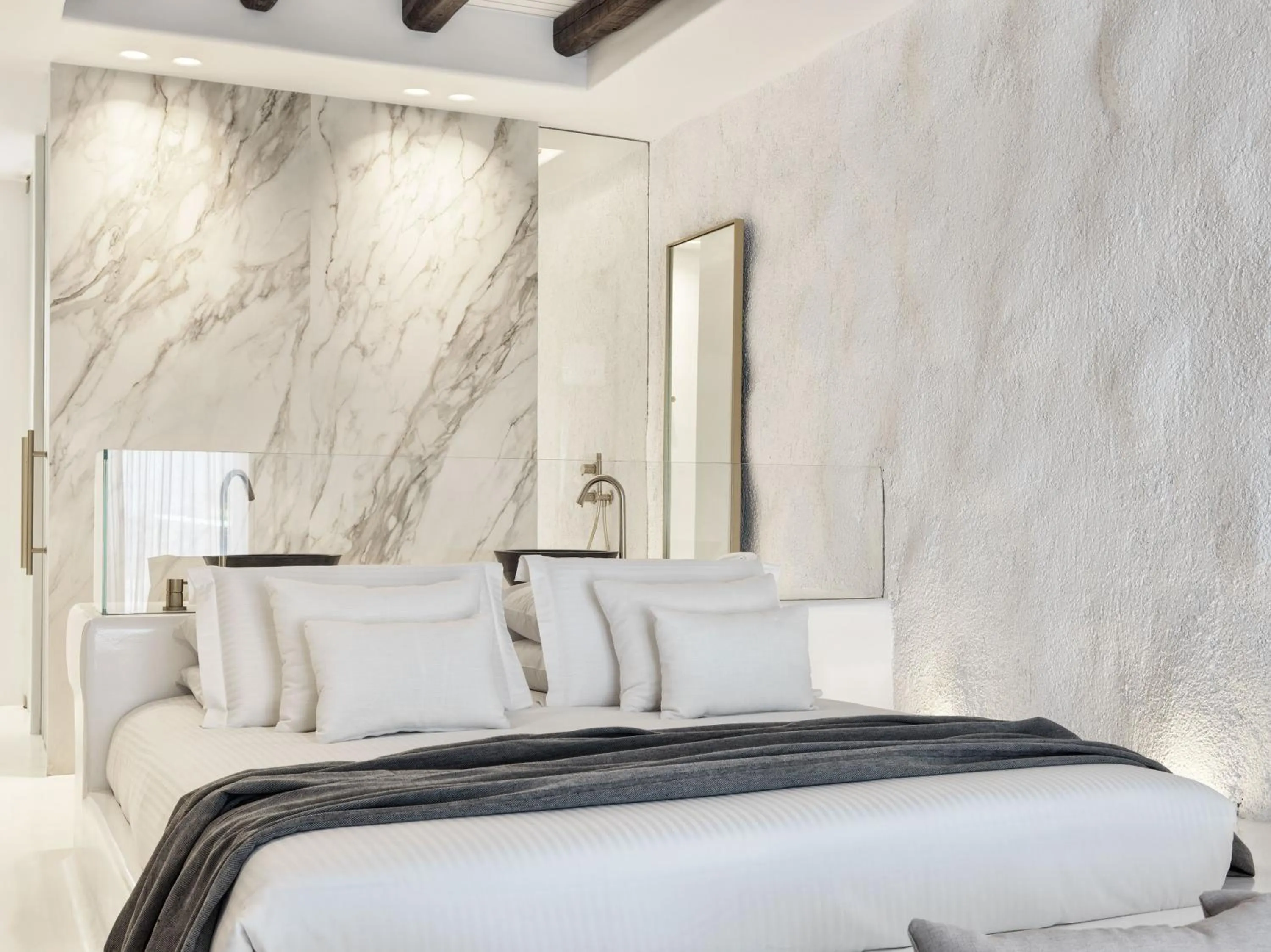 Bed in Mykonos Earth Suites