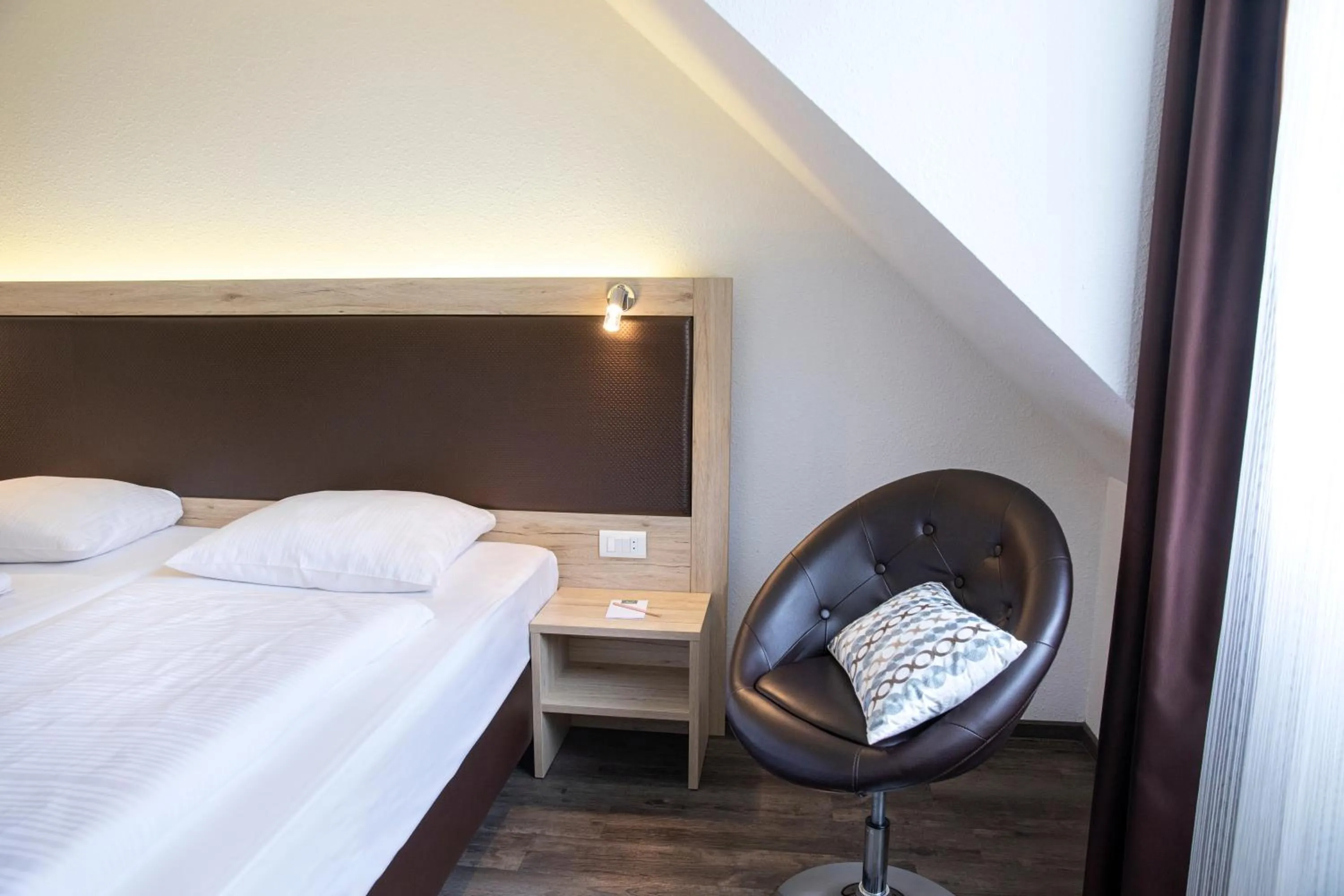 Photo of the whole room, Bed in ACHAT Hotel Monschau