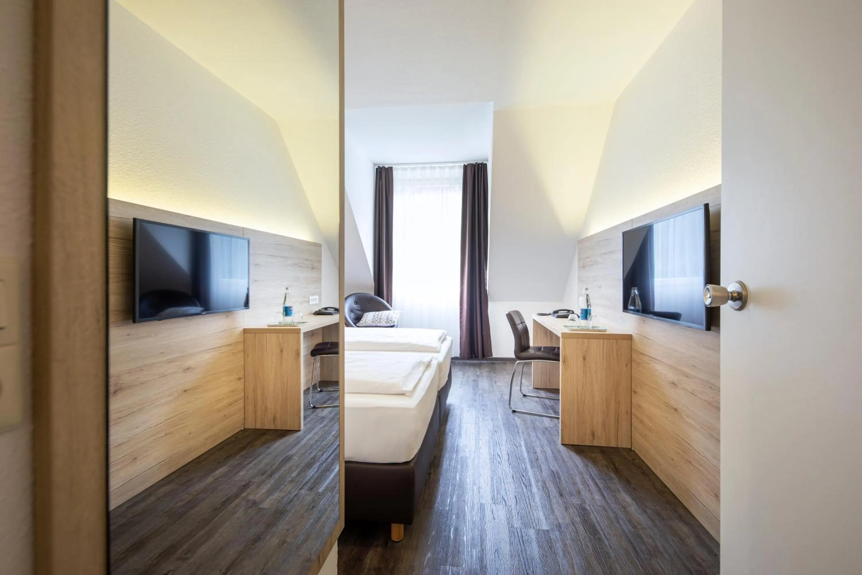 Photo of the whole room, Bed in ACHAT Hotel Monschau