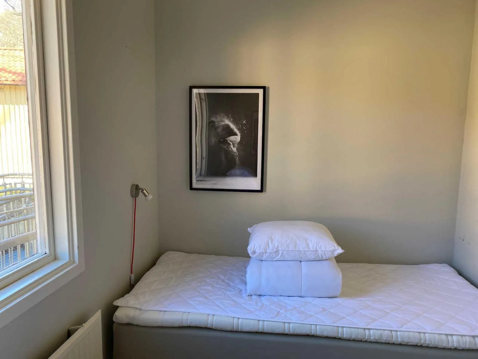 Bed in Hunnebostrands vandrarhem Gammelgården