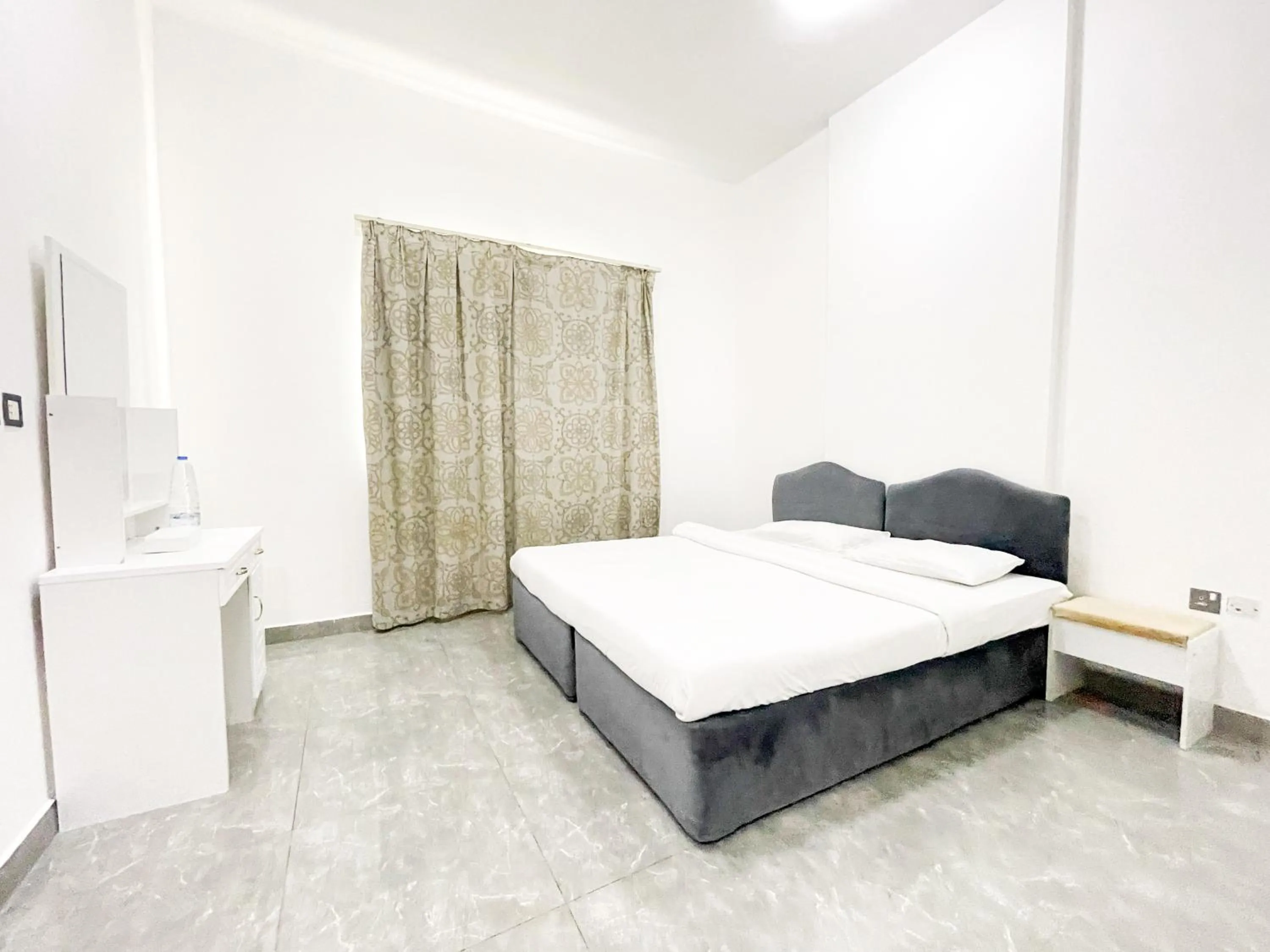 Bed in Warsan Star Residence - Home Stay
