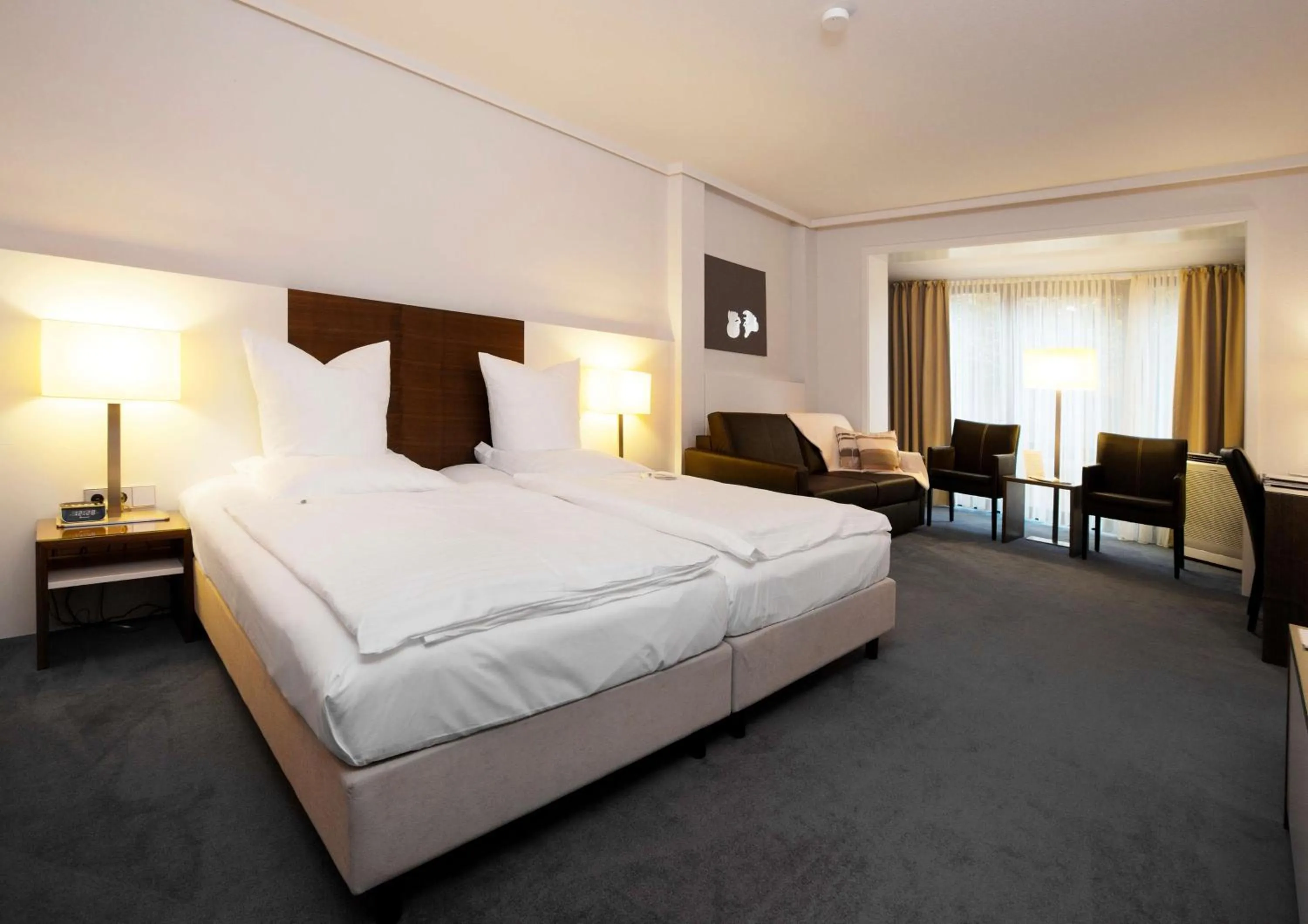 Photo of the whole room, Bed in Privathotel alte mühle Wolfsburg-Weyhausen