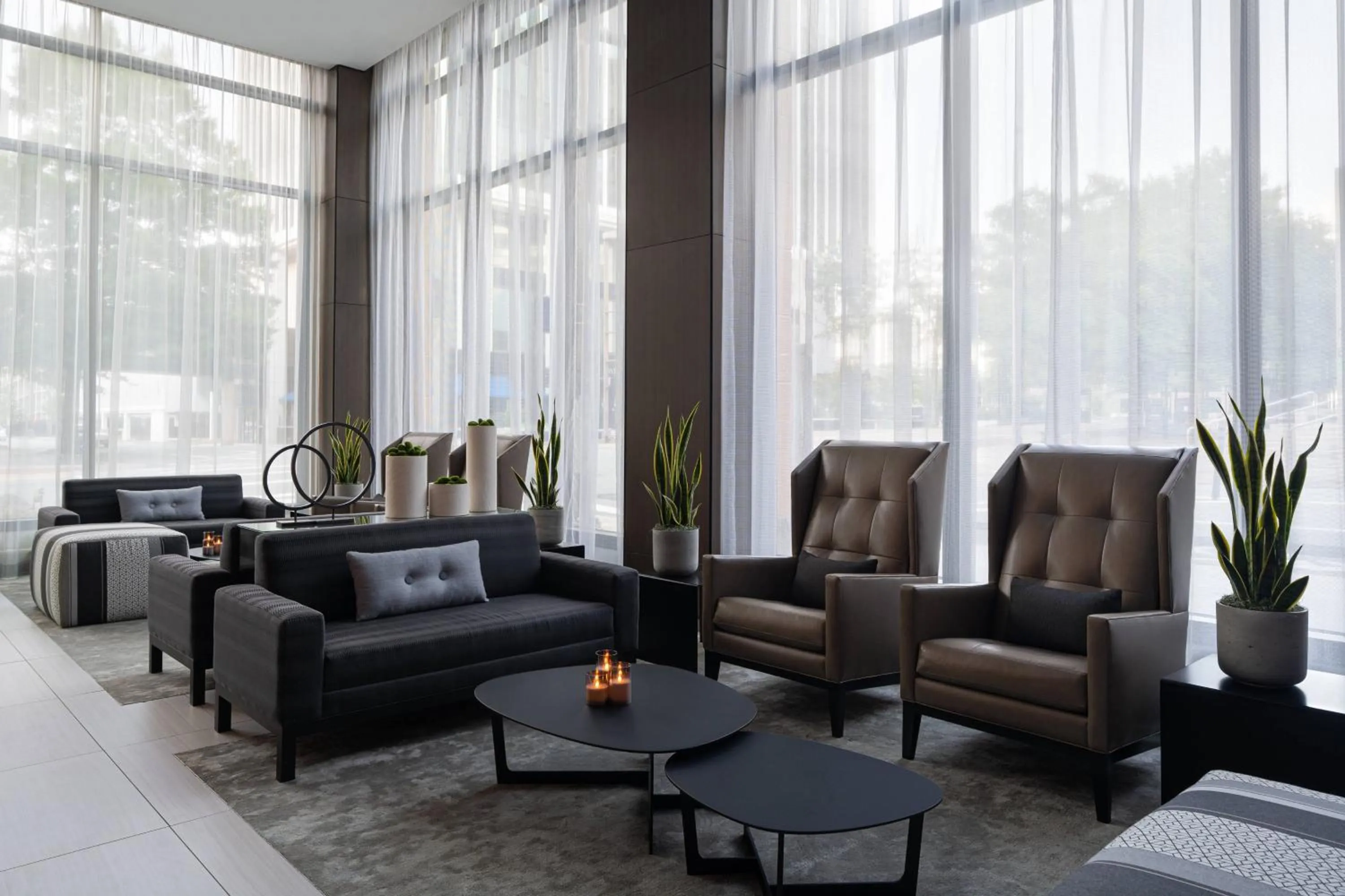 Lounge or bar in AC Hotel by Marriott Little Rock Downtown