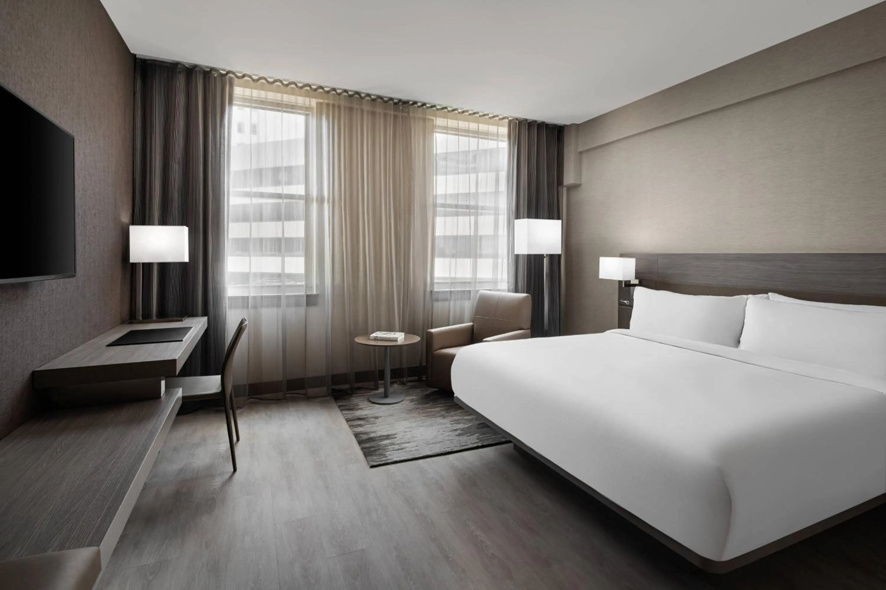 Photo of the whole room, Bed in AC Hotel by Marriott Little Rock Downtown