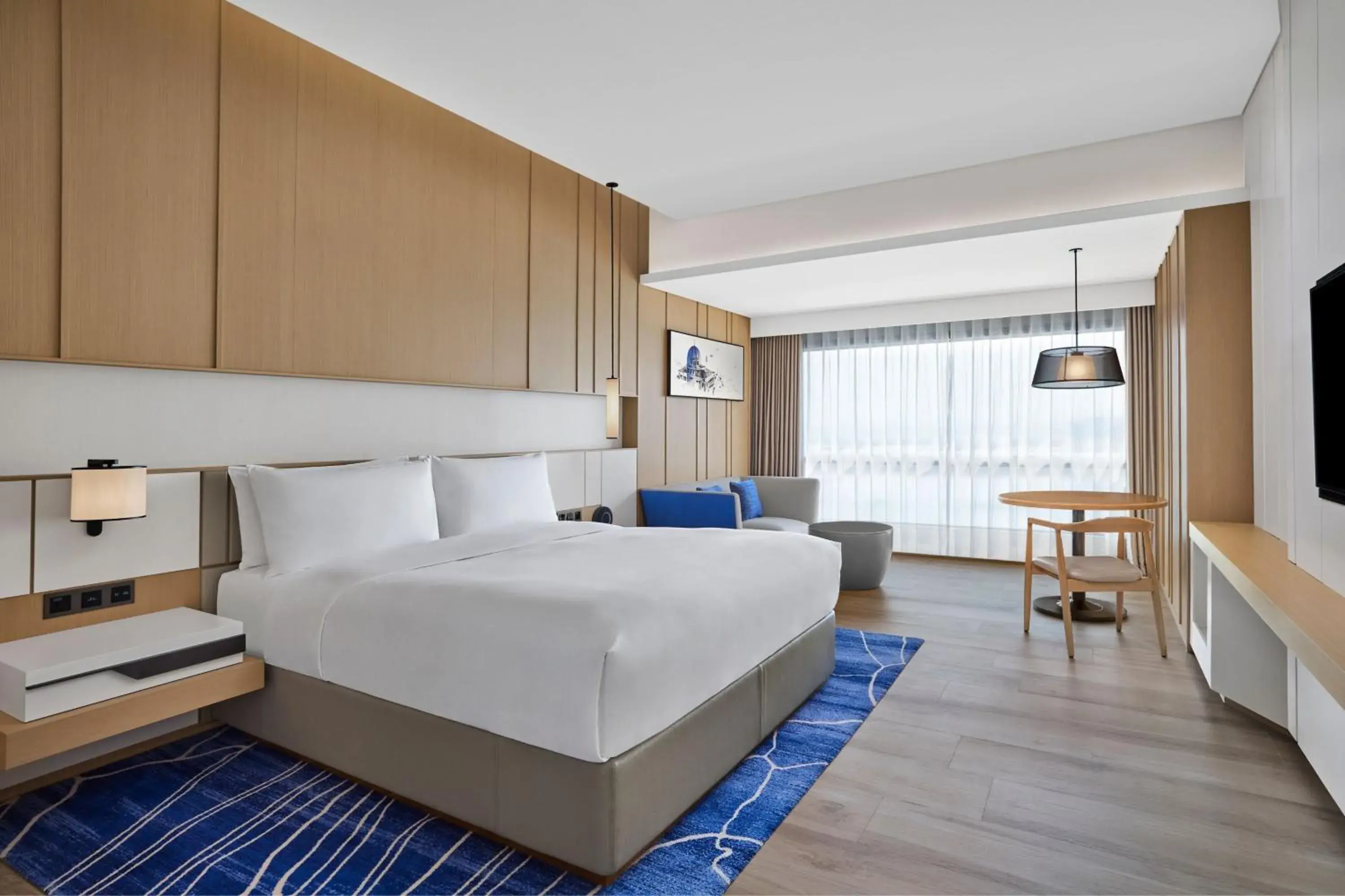 Deluxe King Bed Room with City Views in Courtyard by Marriott Xiamen Deluxe King Bed Room with City Views in Courtyard by Marriott Xiamen