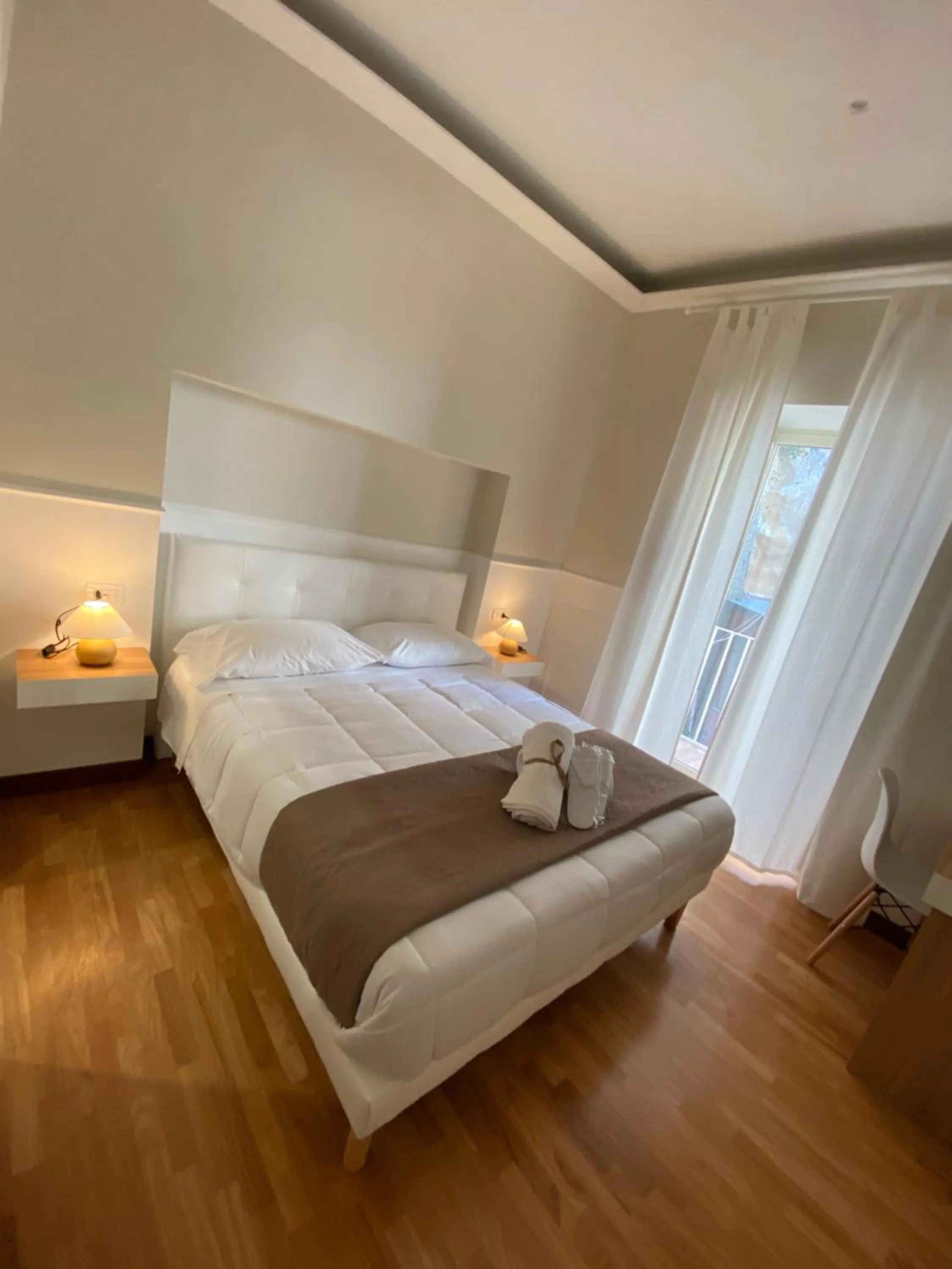 Photo of the whole room, Bed in MAMO al Museo