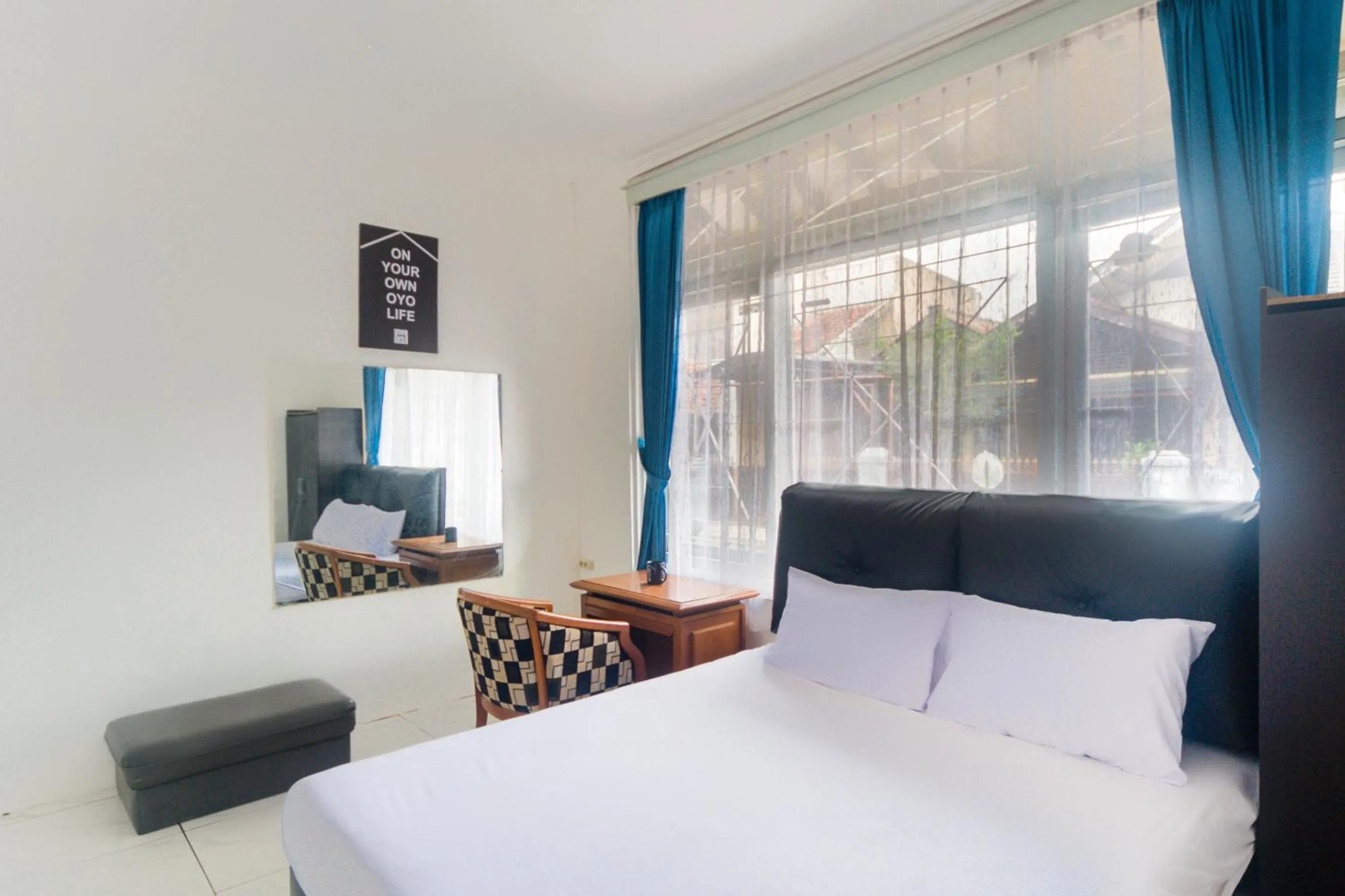 Bedroom in OYO Life 3055 Rumah Enin