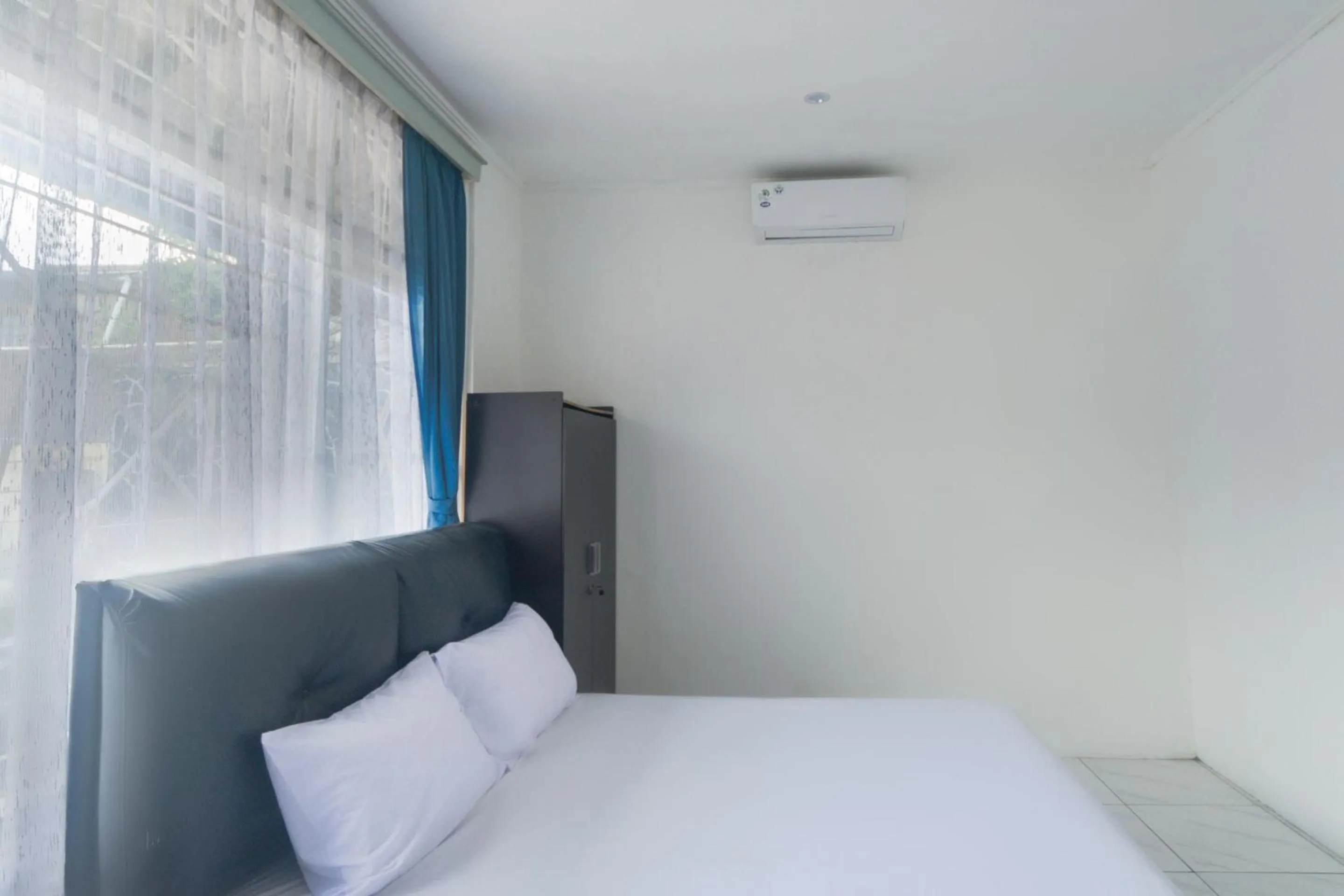 Bedroom in OYO Life 3055 Rumah Enin